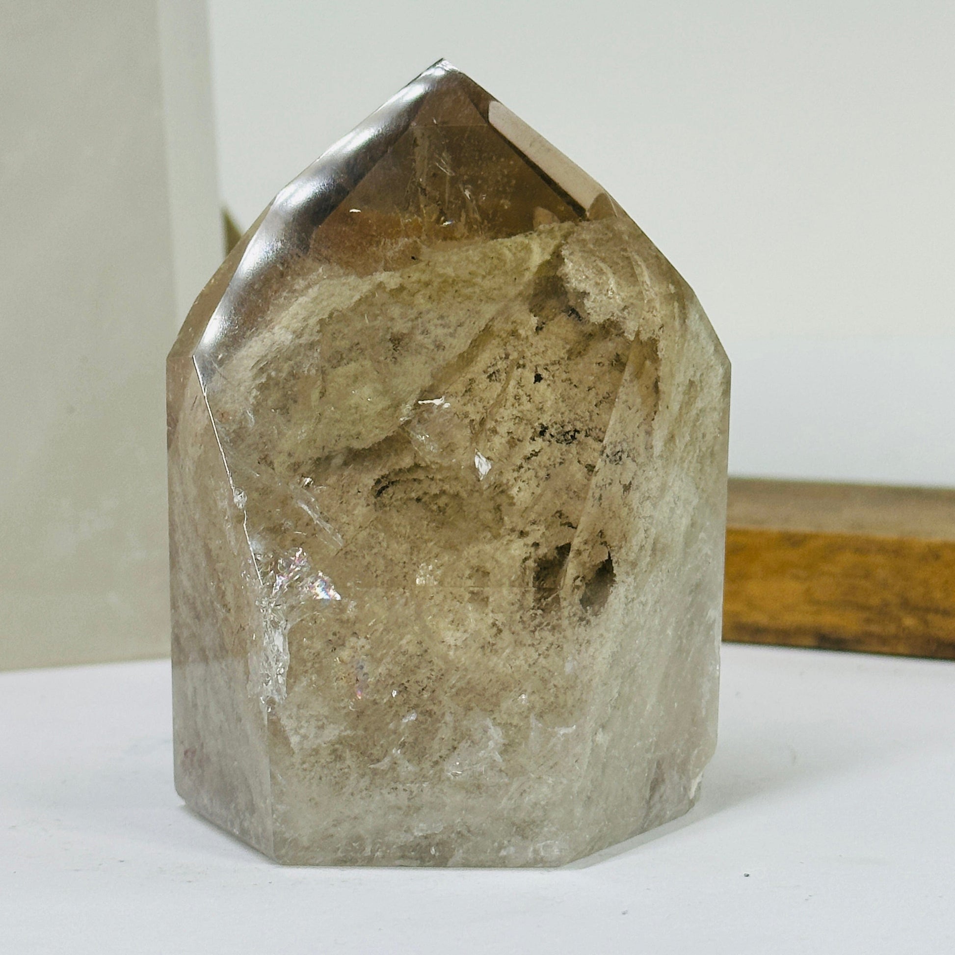 lodalite point with decorations in the background
