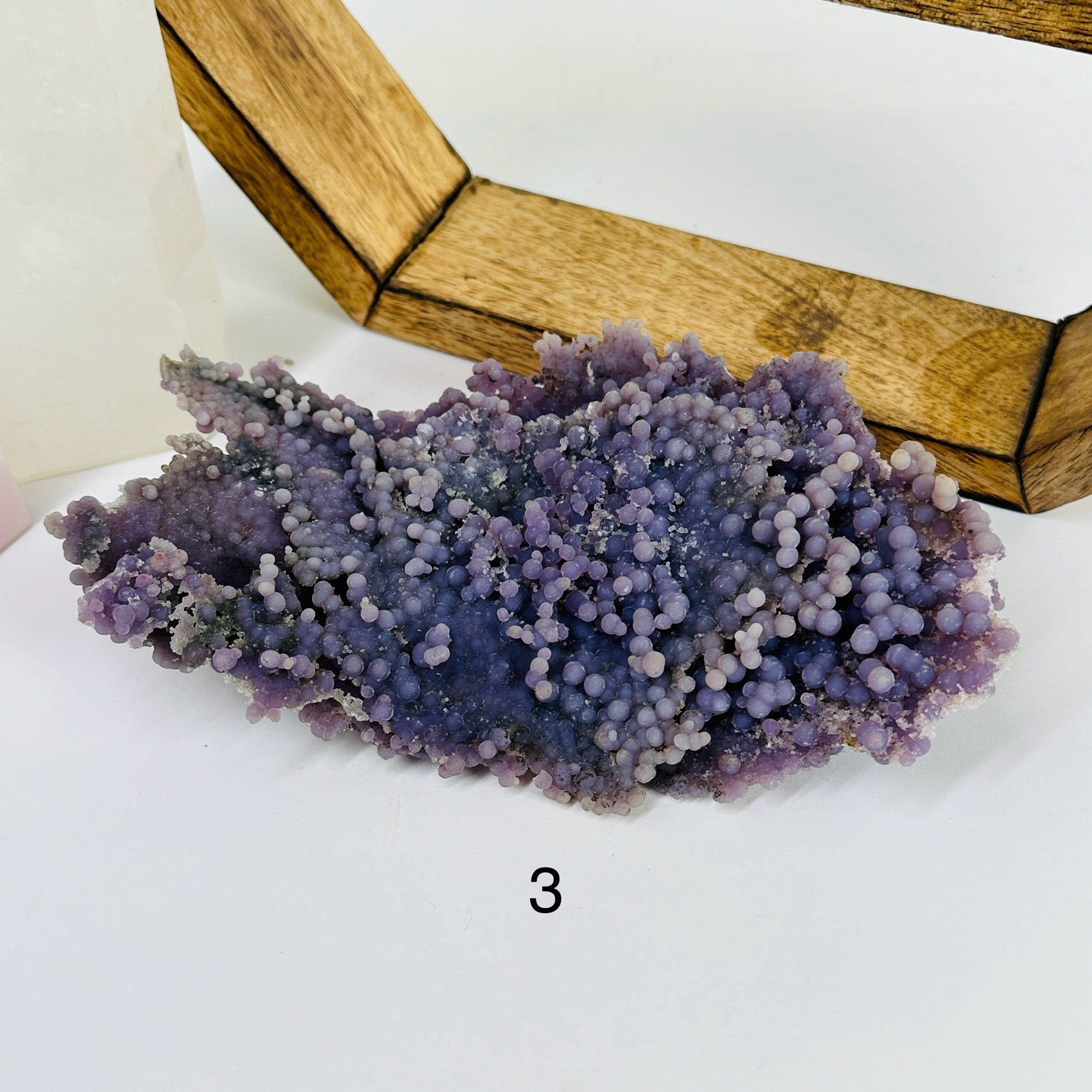 grape agate with decorations in the background