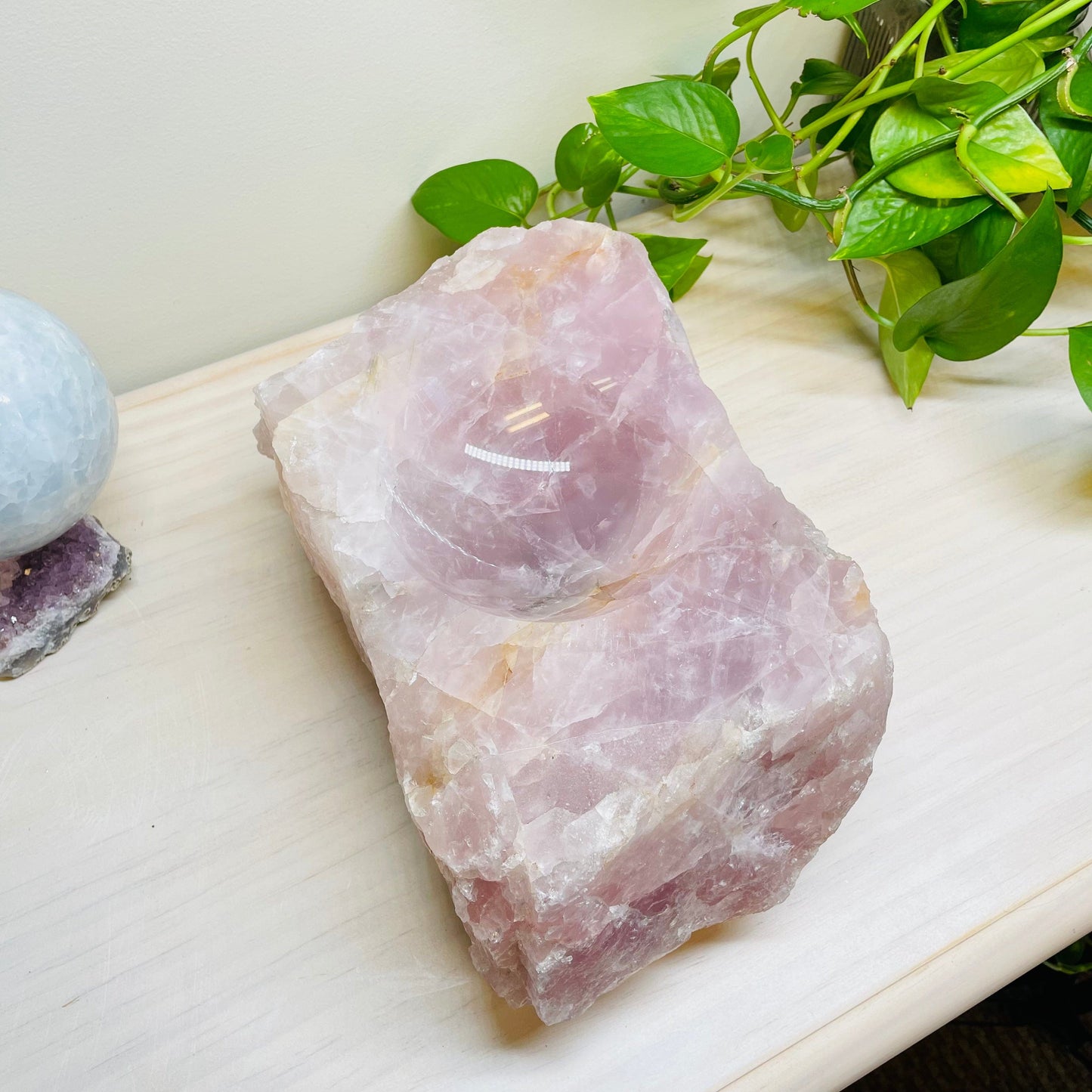 rose quartz is semi polished. the top part is polished smooth and the sides are rough and natural