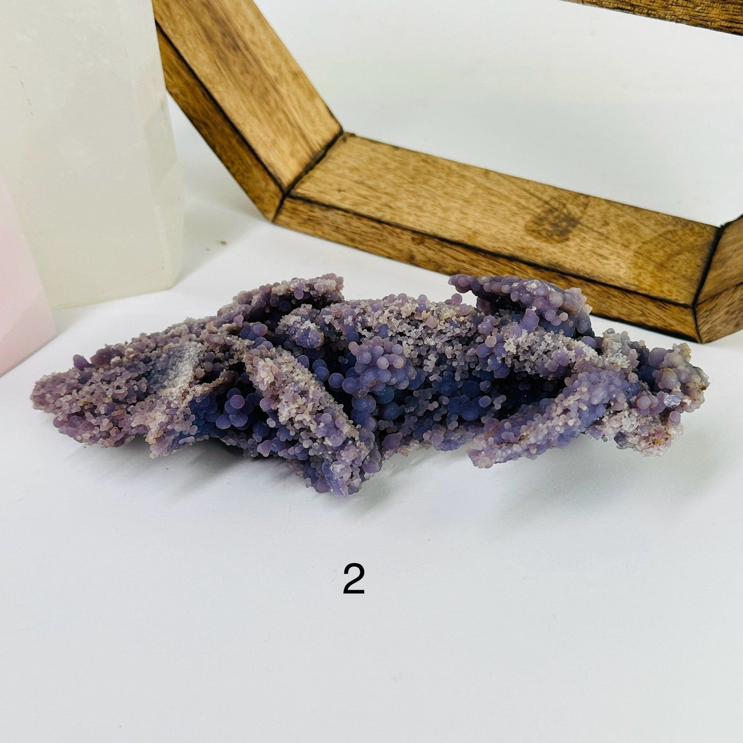grape agate with decorations in the background