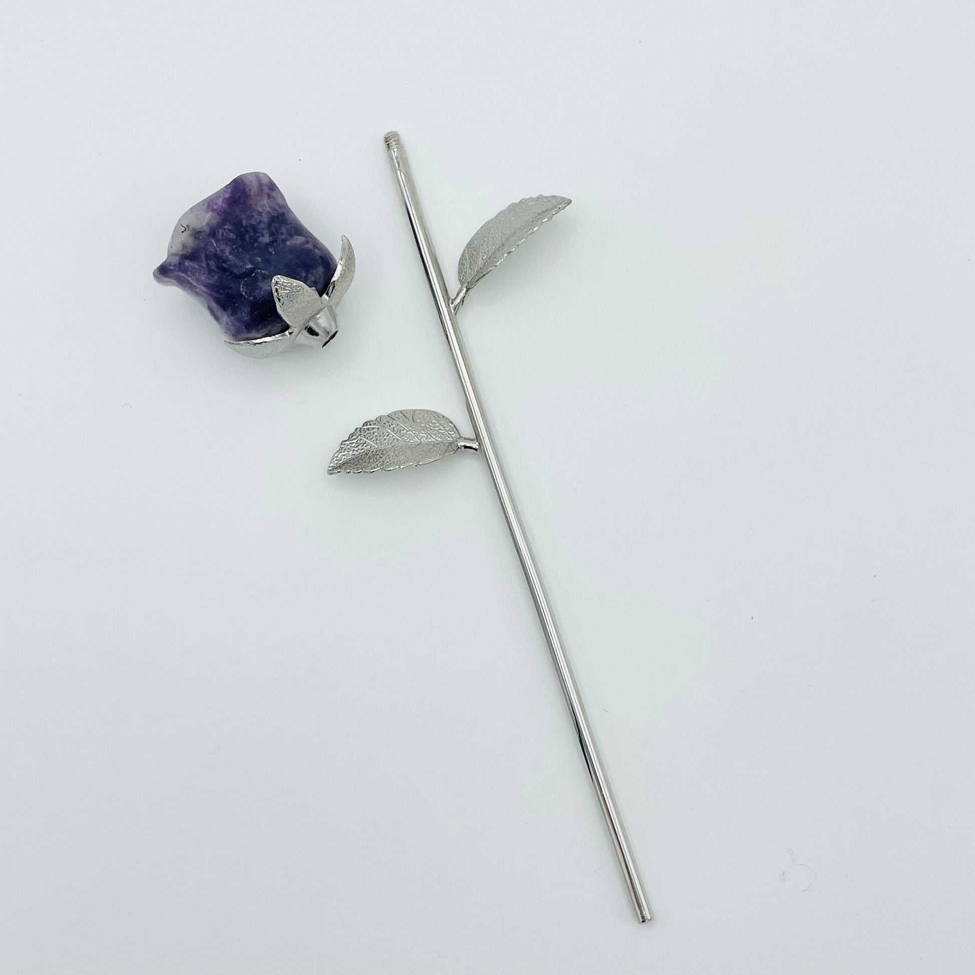 top of the rose screws on to the stem  