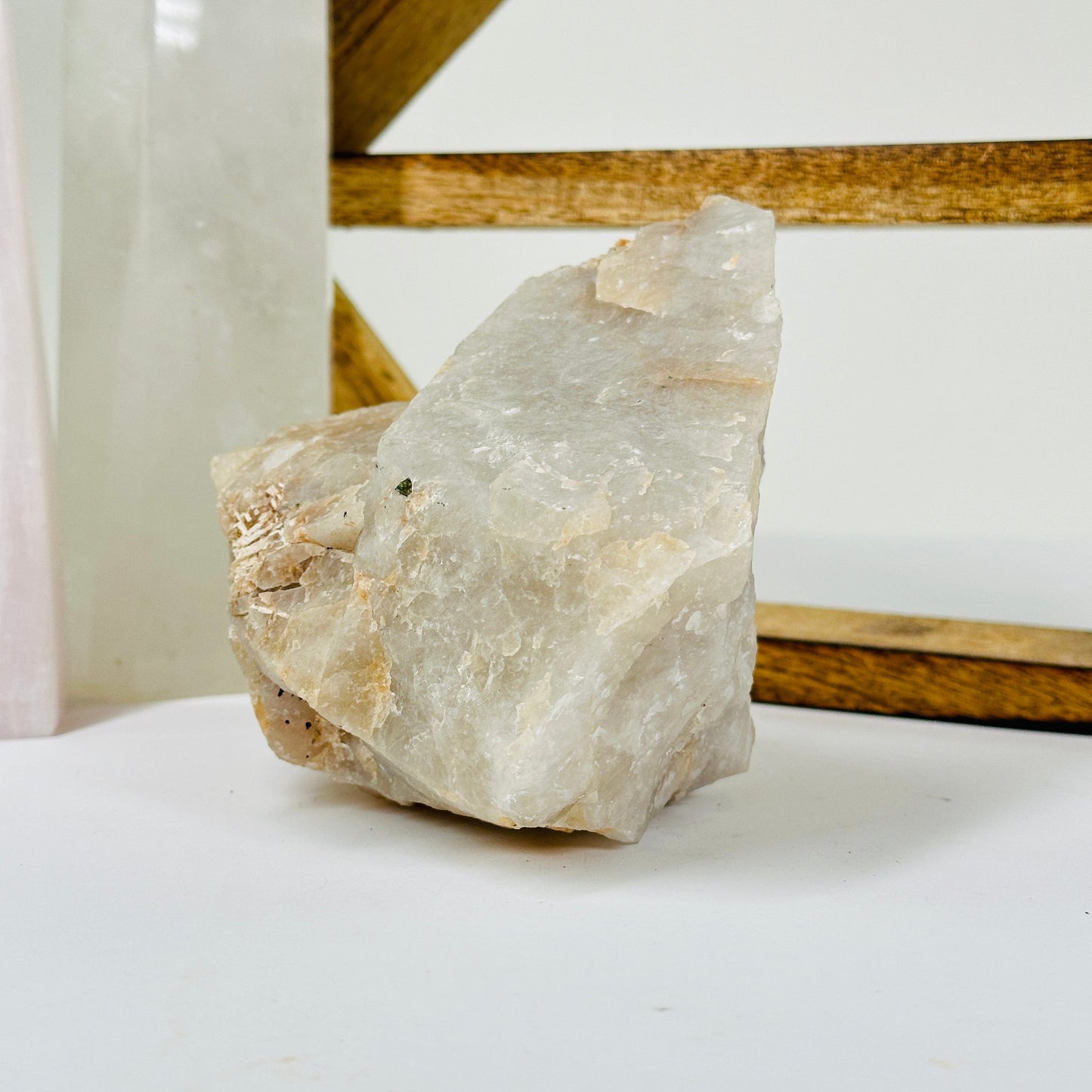 watermelon tourmaline with decorations in the background