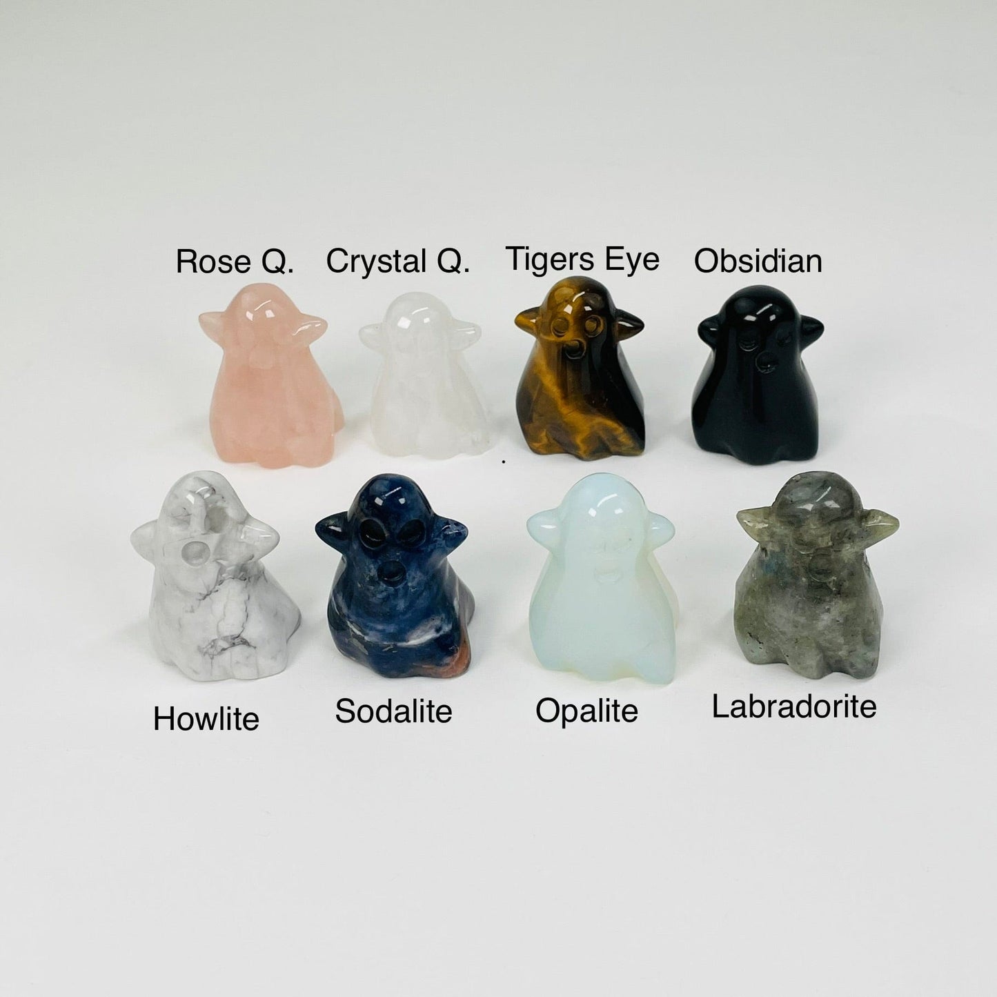 carved gemstone ghost avilable in rose quartz, crystal quartz, tigers eye, black obsidian, white howlite, sodalite, opalite and labradorite 