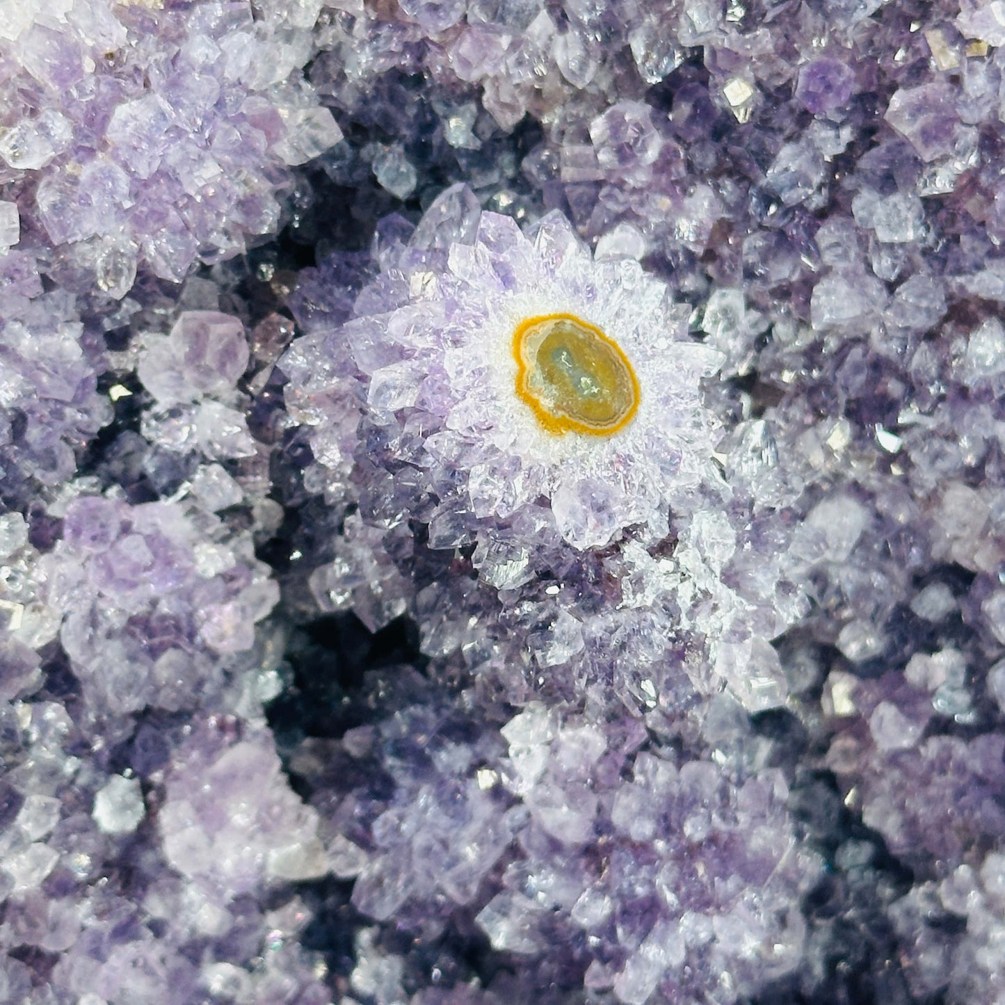amethyst cut base with decorations in the background