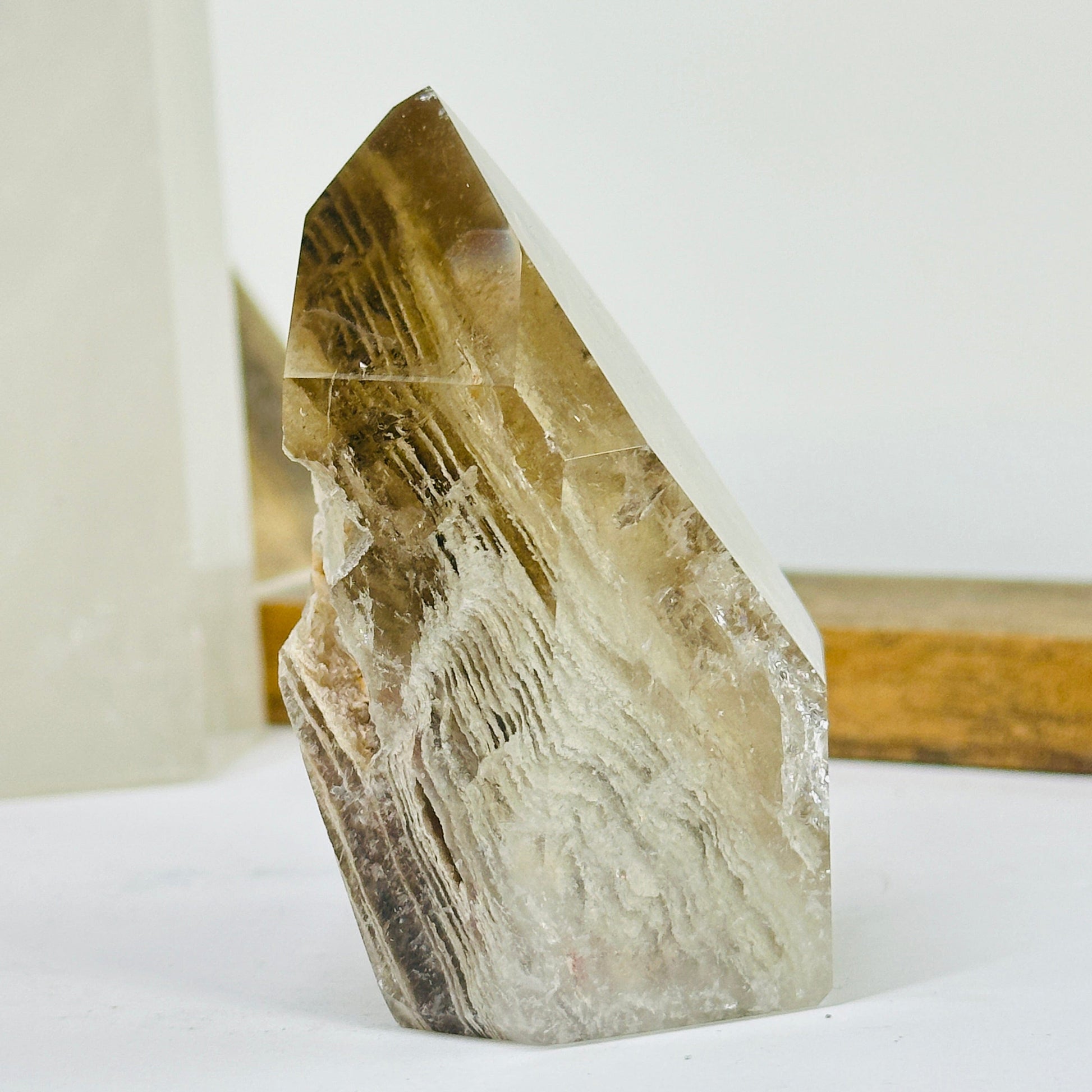 lodalite point with decorations in the background