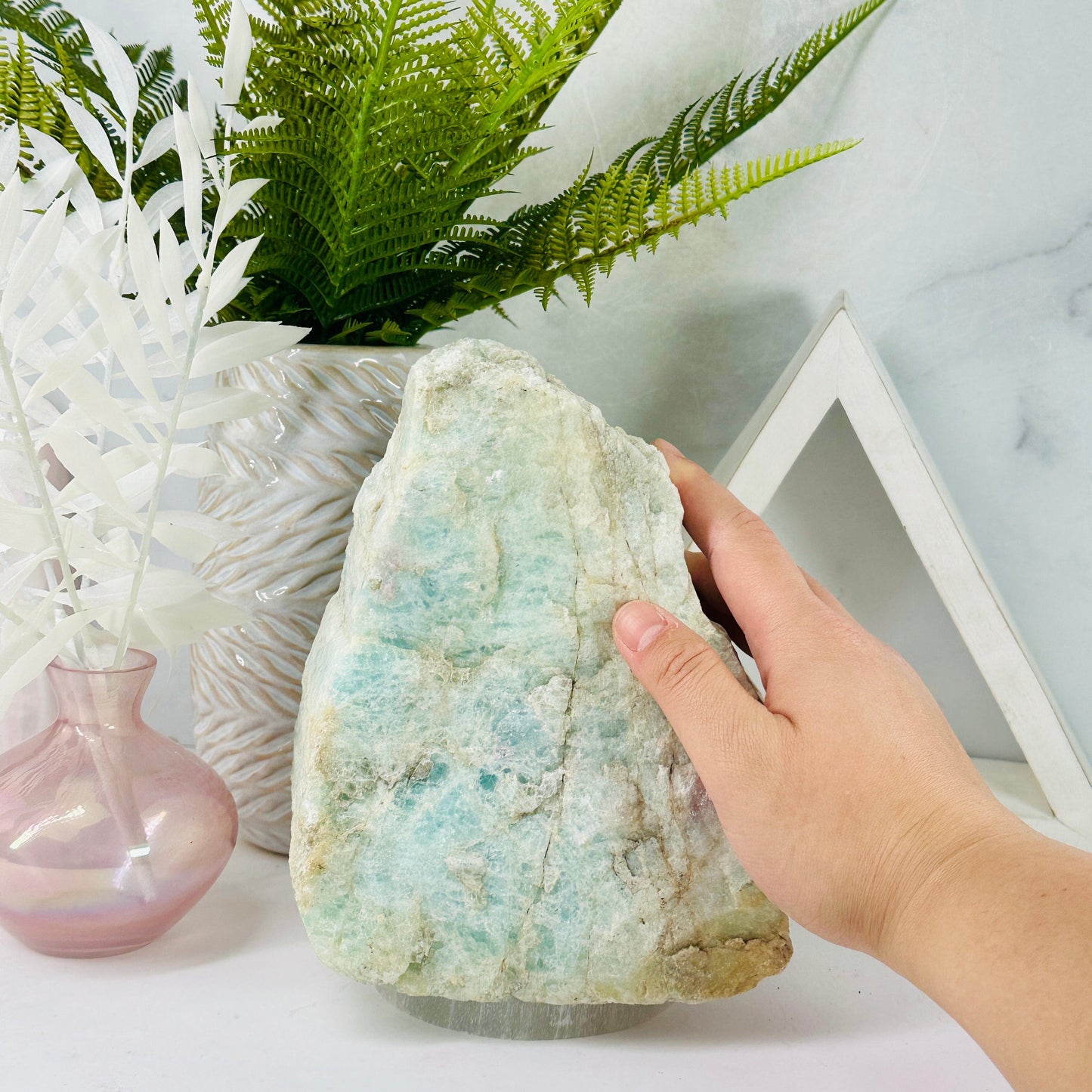 Aquamarine with Mica - large rough natural crystal with hand for size reference