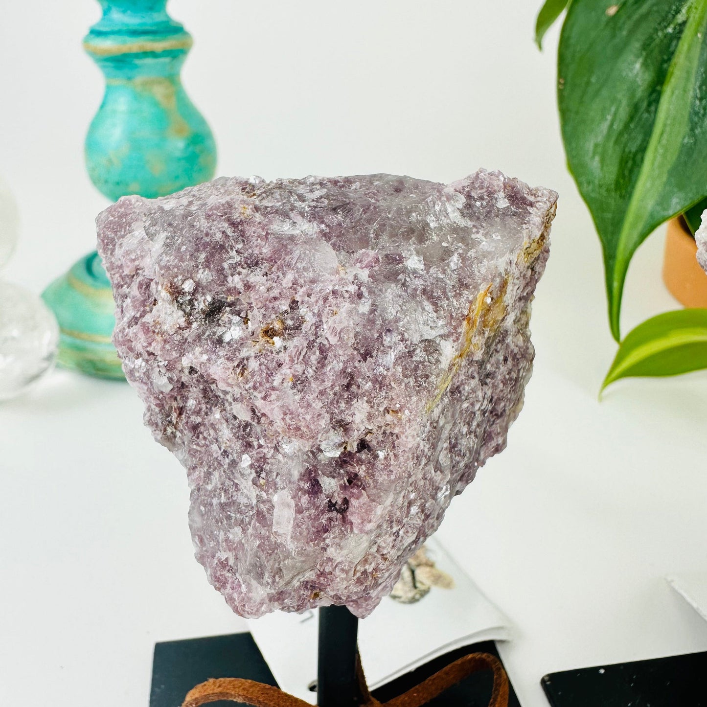 Lepidolite on Metal Stand up close of stone