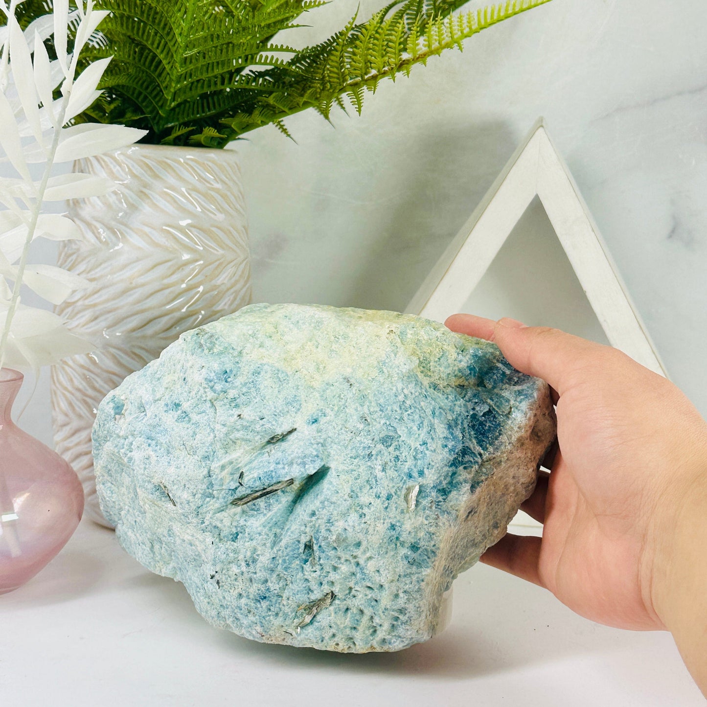 Aquamarine with Mica - rough natural crystal with hand for size reference