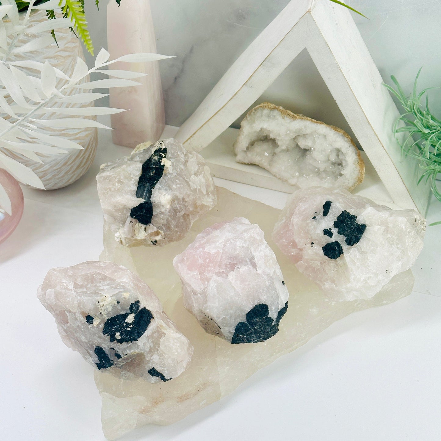 Black Tourmaline on Rose Quartz Matrix - You Choose - all variants on quartz platter with props in the background