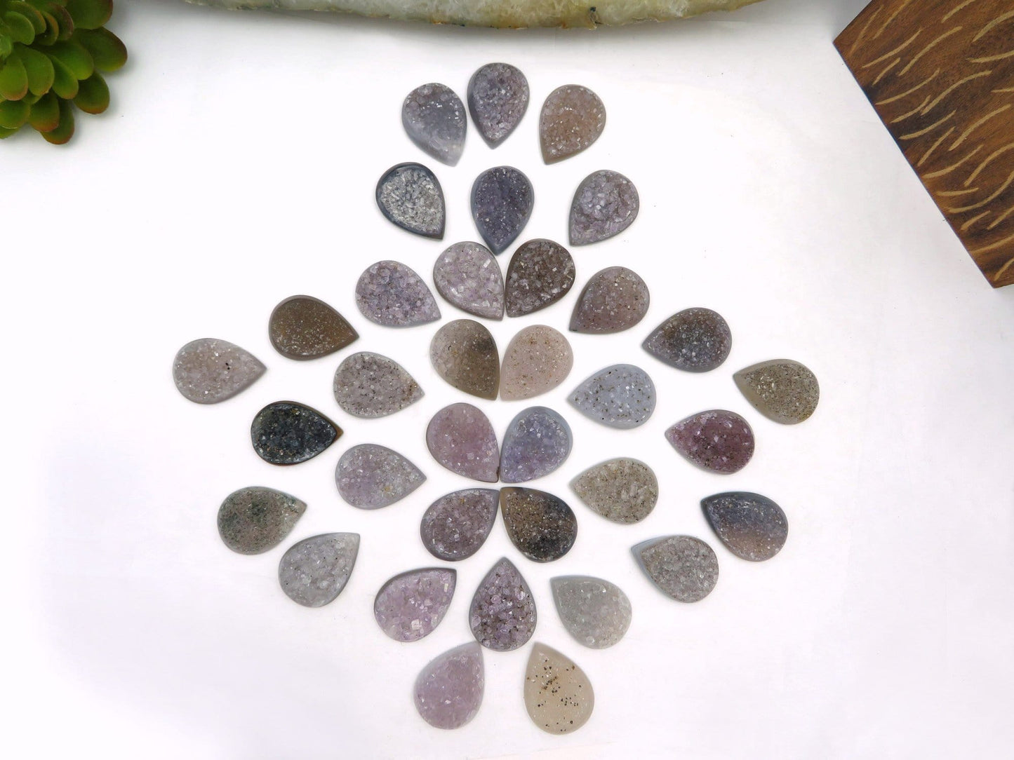druzy cabs on a table in a design