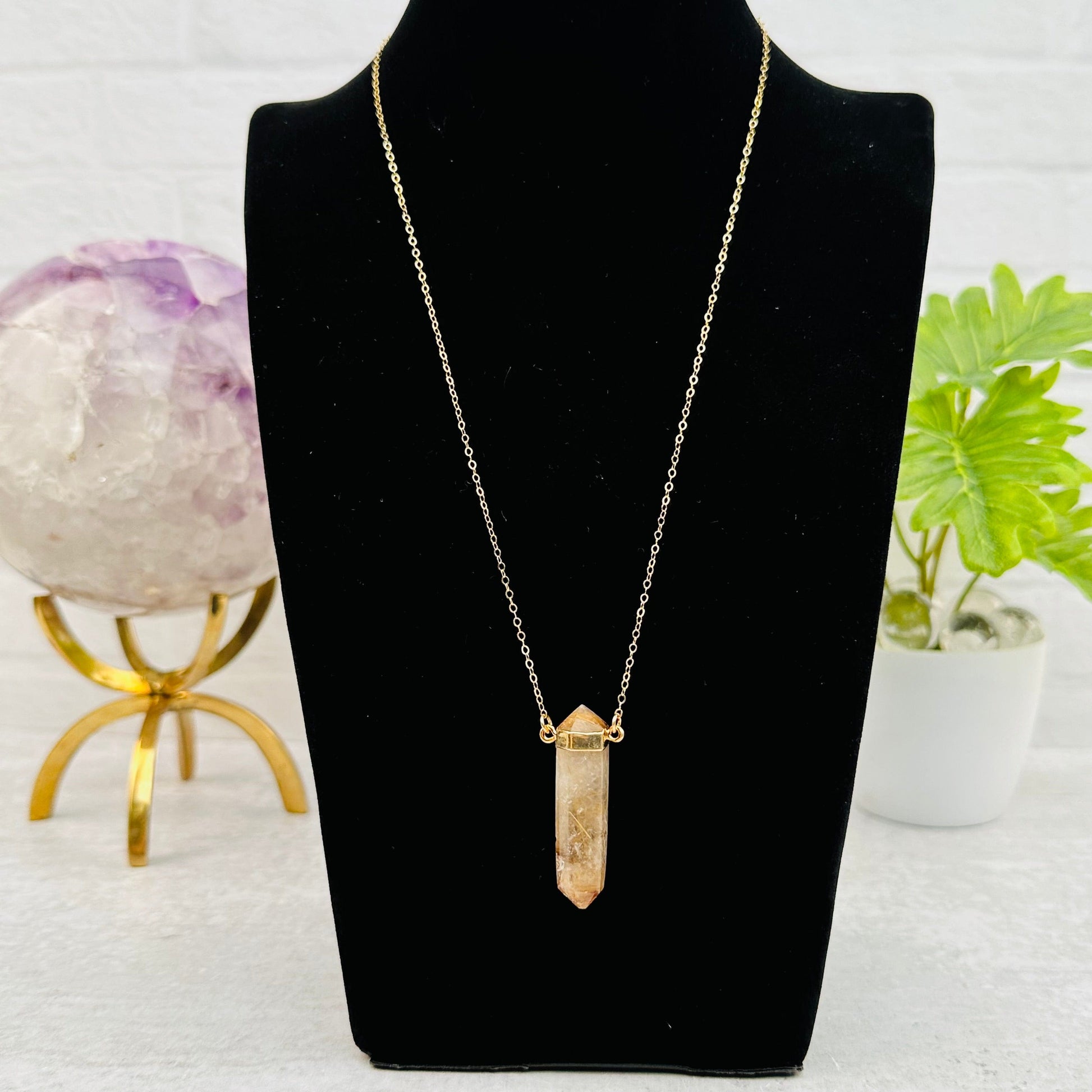 necklace displayed to show how it hangs 