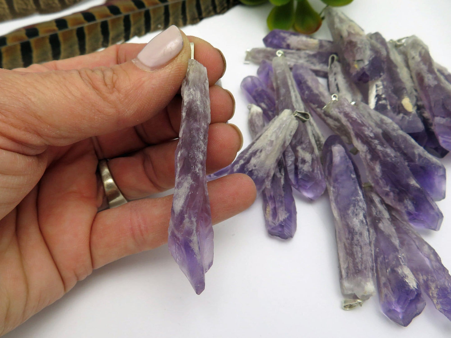 pendants in hand for size reference 
