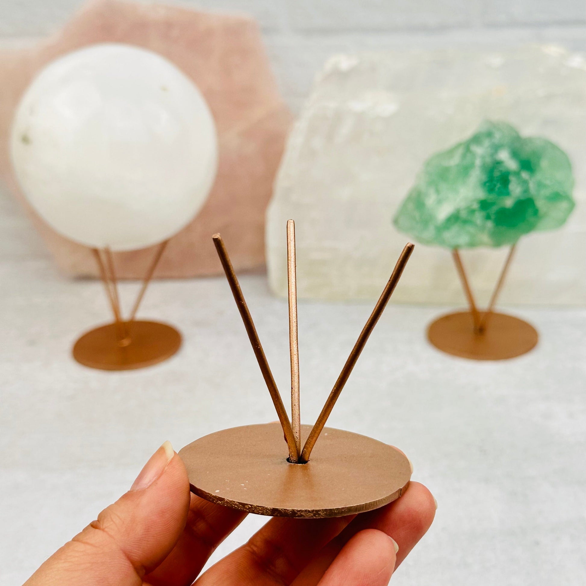 Metal Crystal Stand in hand for size reference 