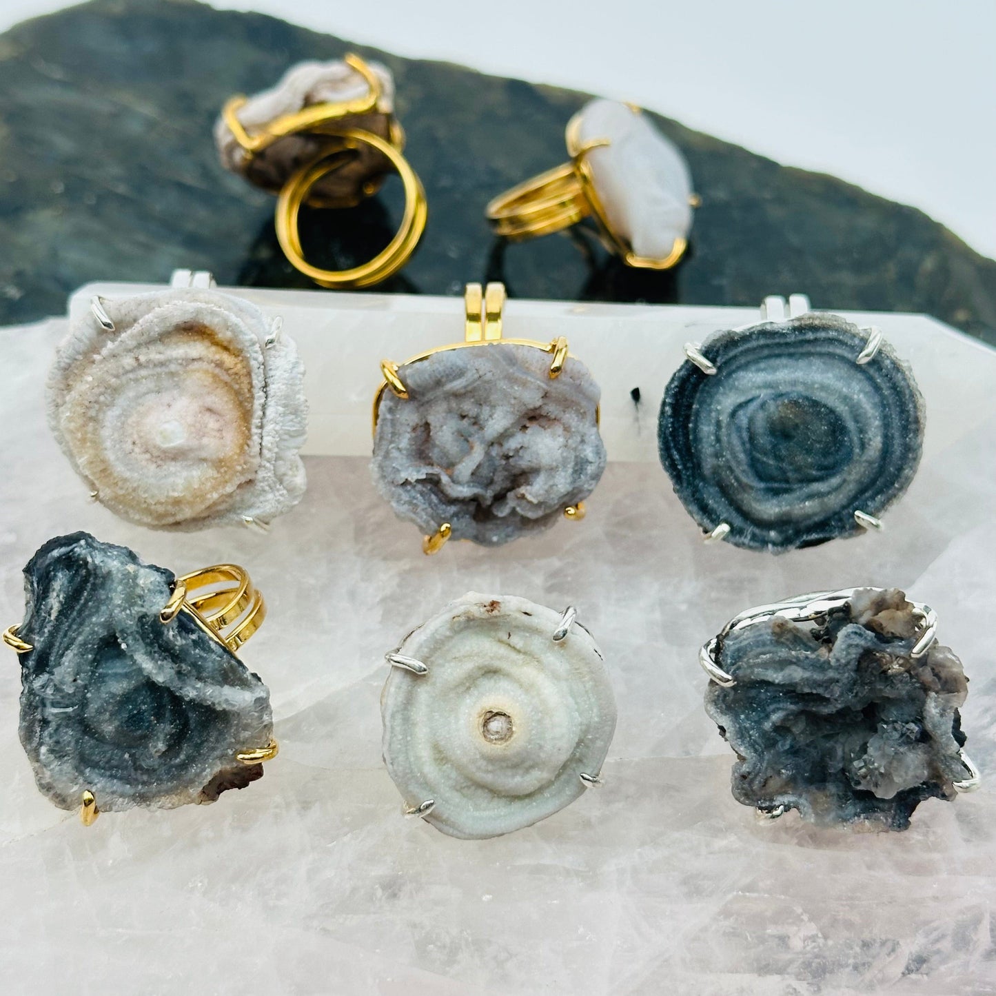 multiple chalcedony rings displayed to show the differences in the color shades and sizes 
