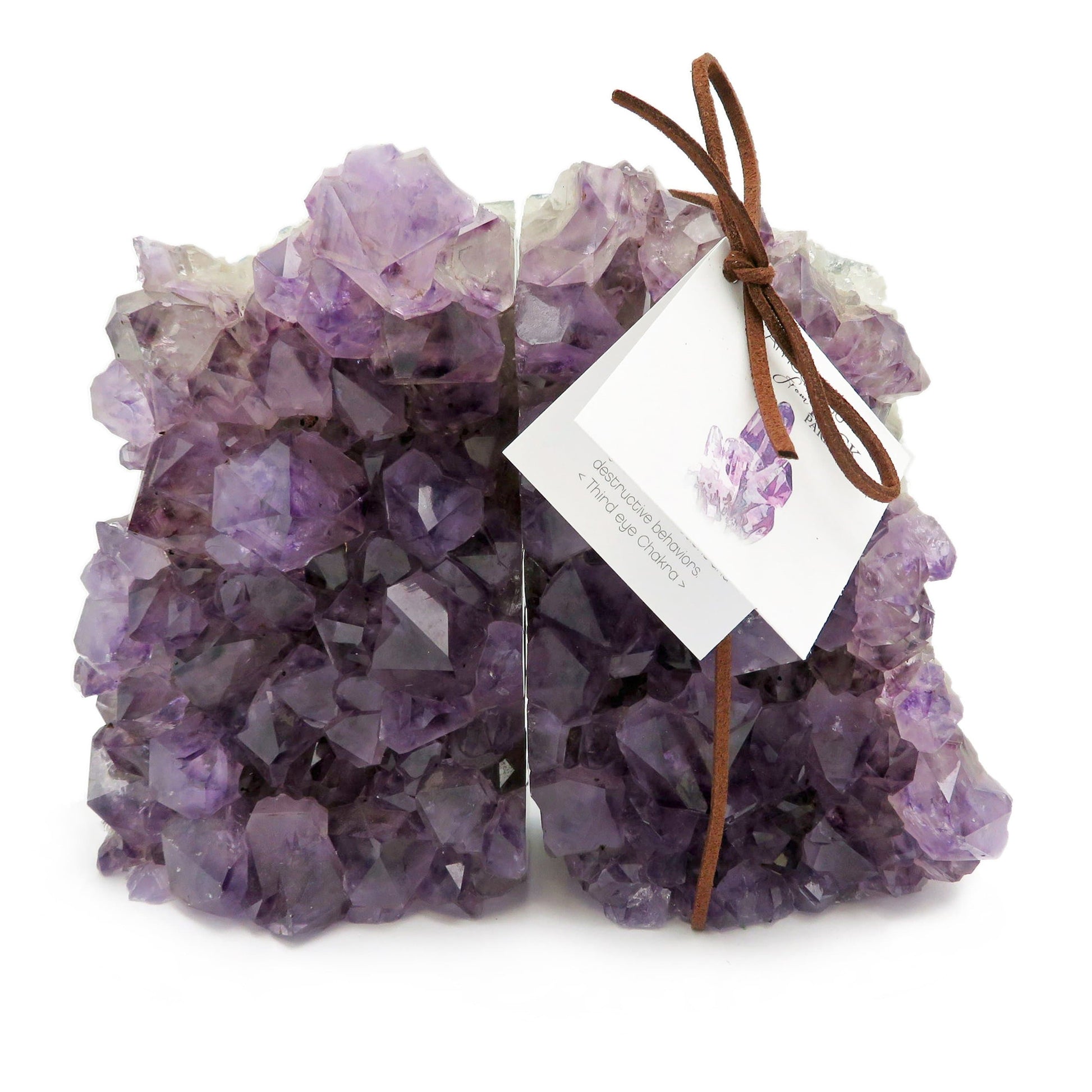 Amethyst book end displayed on a white back ground.