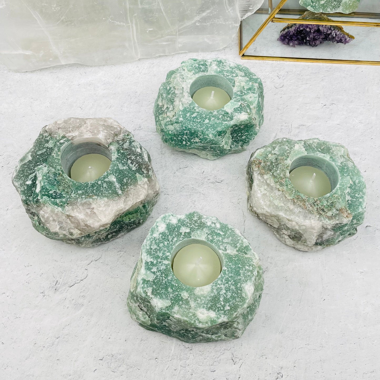 multiple candles displayed to show the differences in the sizes and color shades 