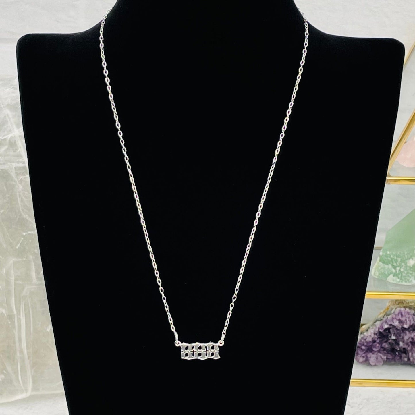 small link chain necklace displayed to show how it hangs 