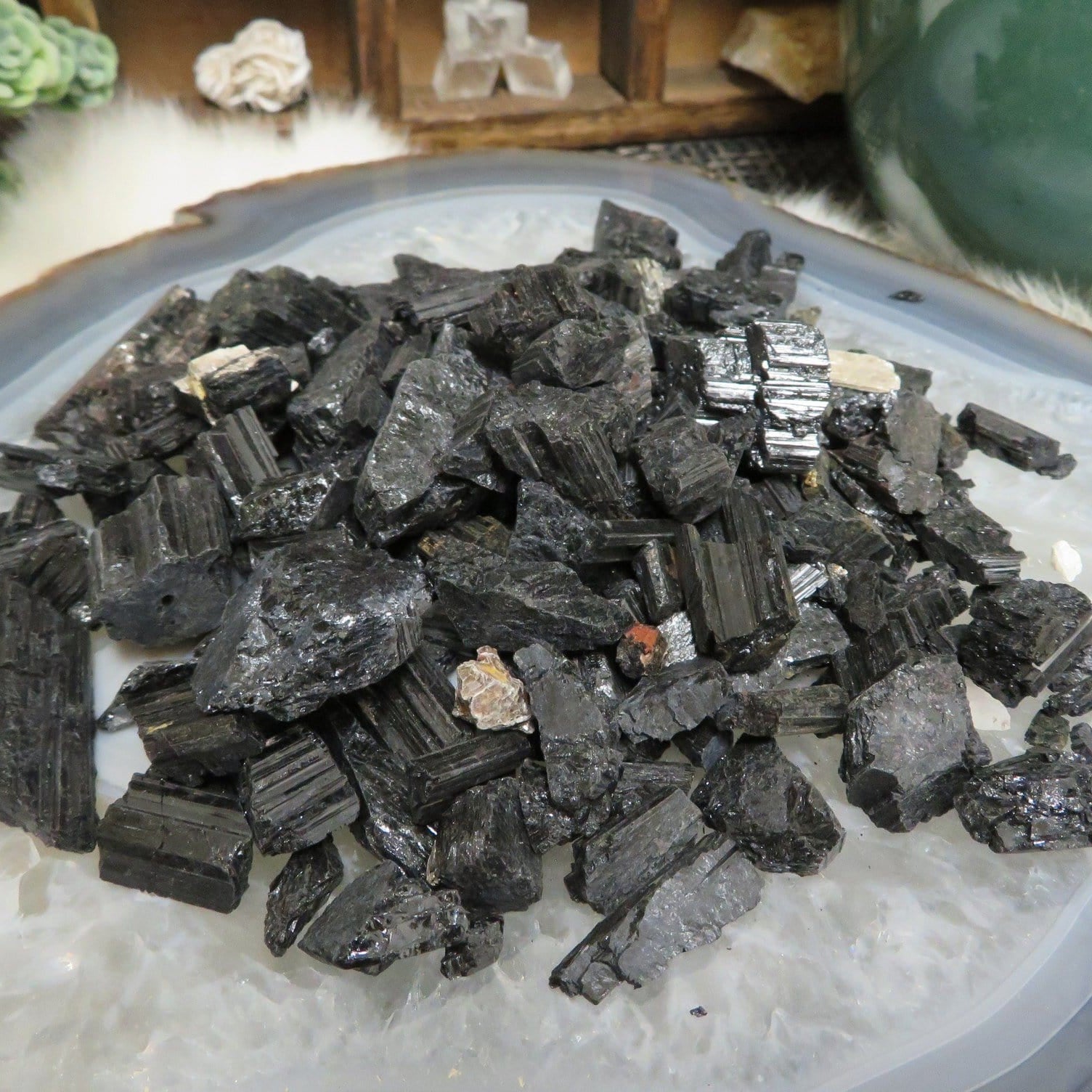 1 Pound of Black Tourmaline Assortment displayed to show various sizes like Pendant Size to Small Crumbles