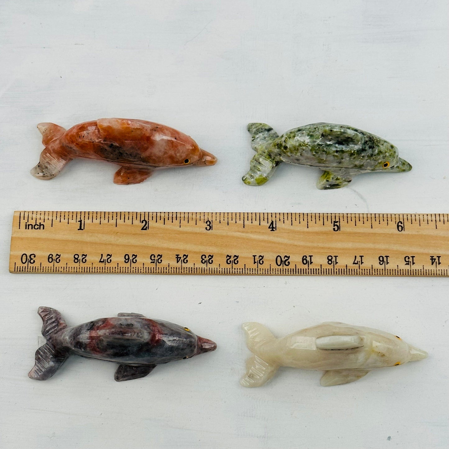 dolphins next to a crystal for size reference  