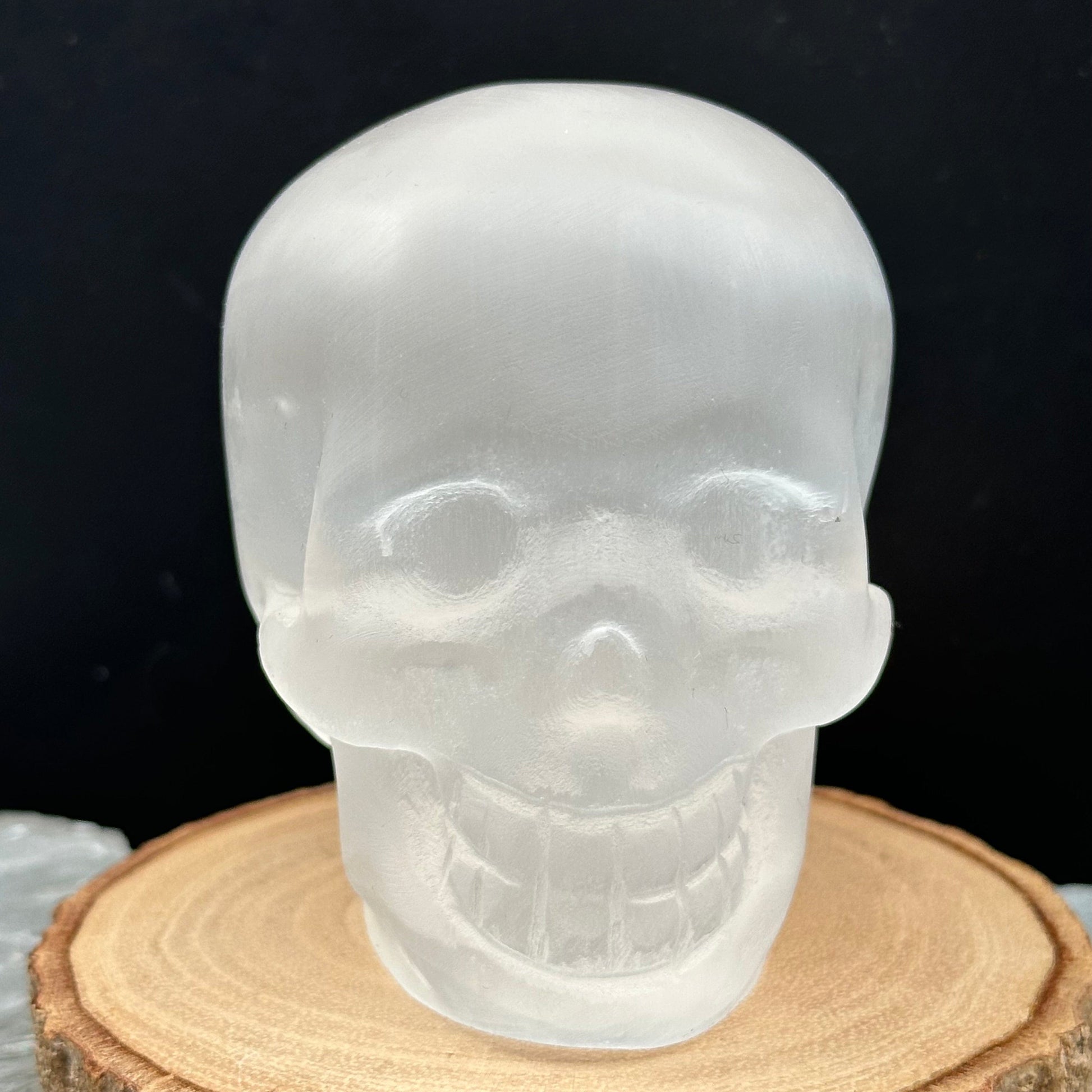close up of the engraved details on this crystal skull 