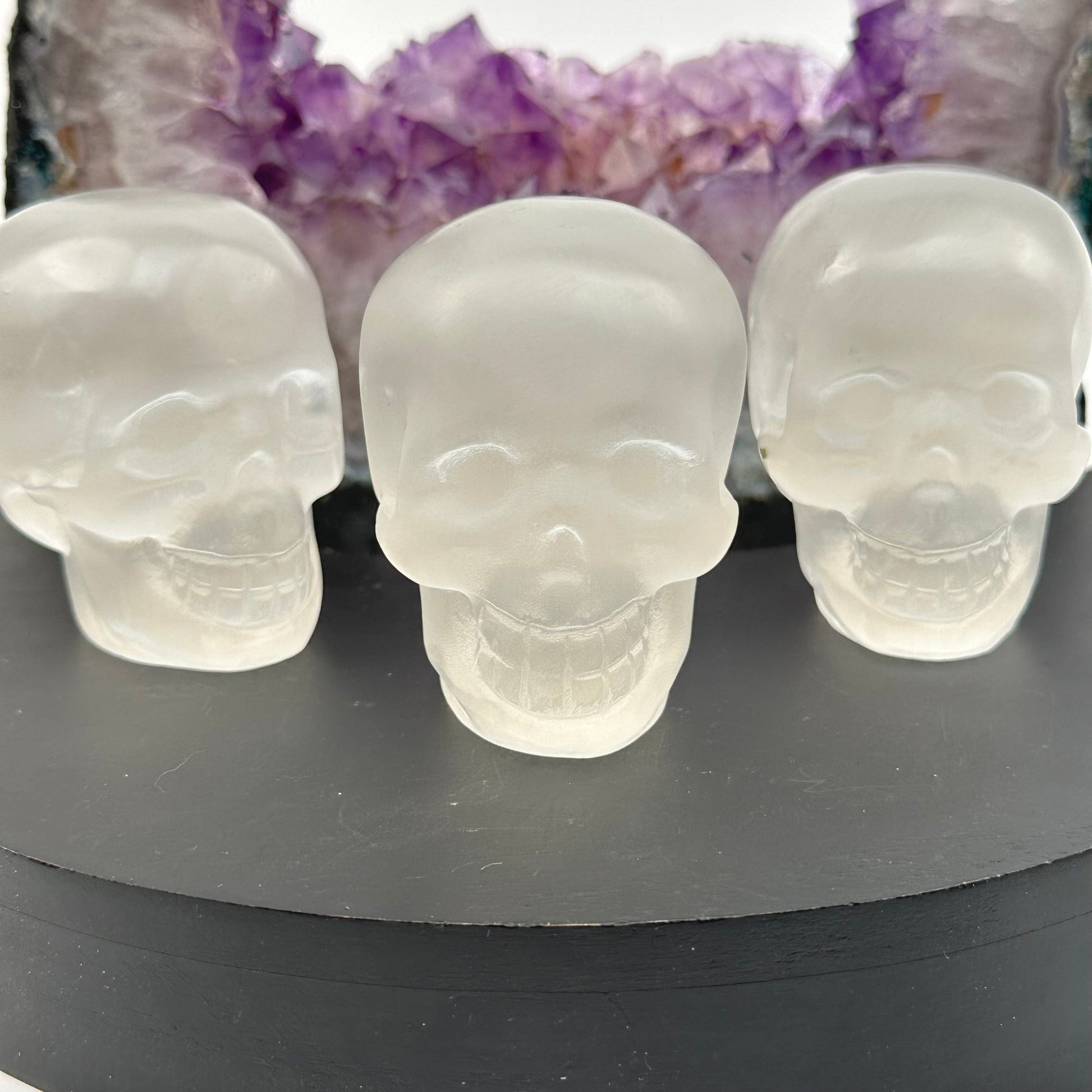 selenite skulls displayed as home decor 
