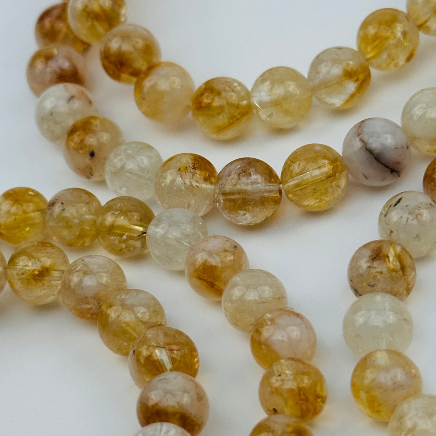 close up of the details on these crystal bead bracelets
