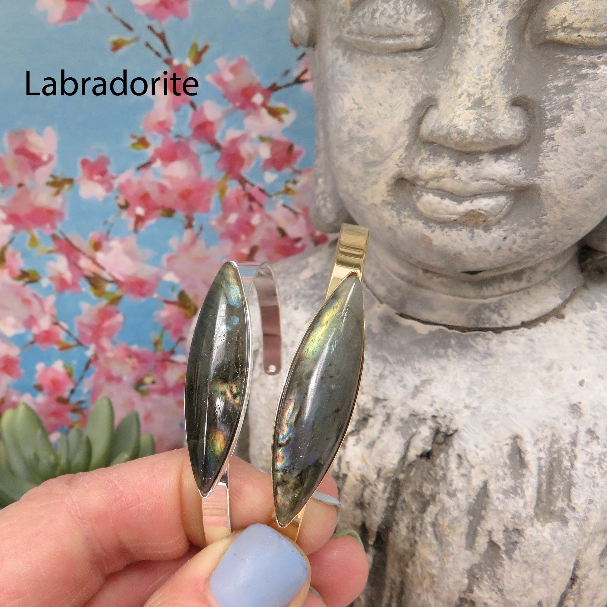 labradorite bracelets in a hand