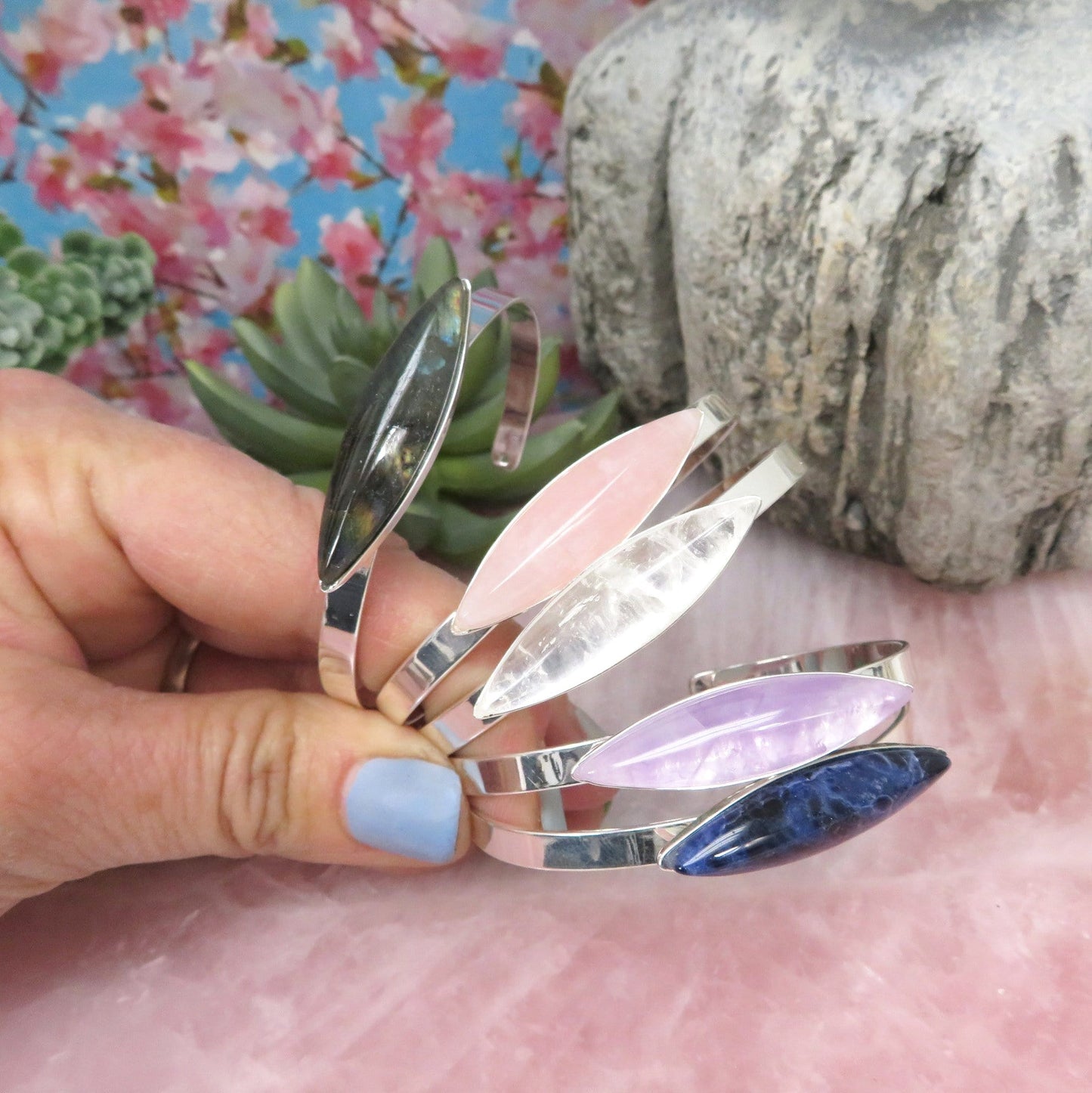 5 marquise bracelets in a hand