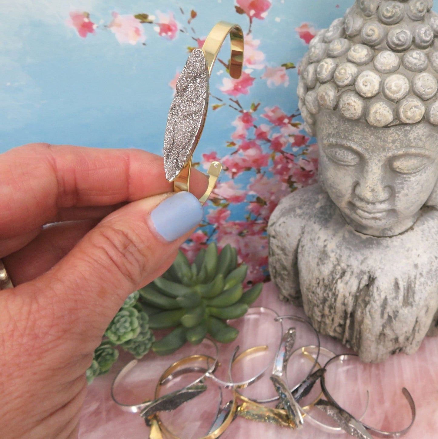 Titanium Druzy Stone Bracelet  held in a hand