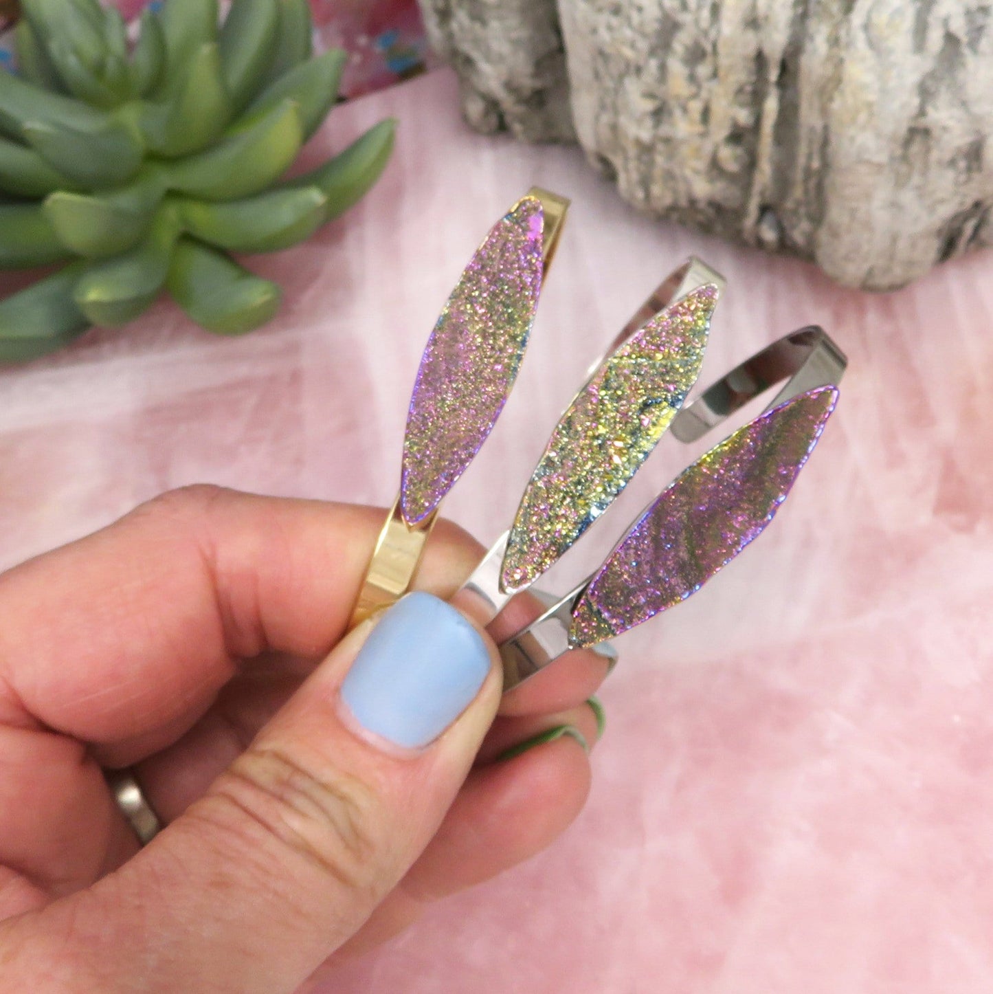 Titanium Druzy Stone Bracelets in a hand