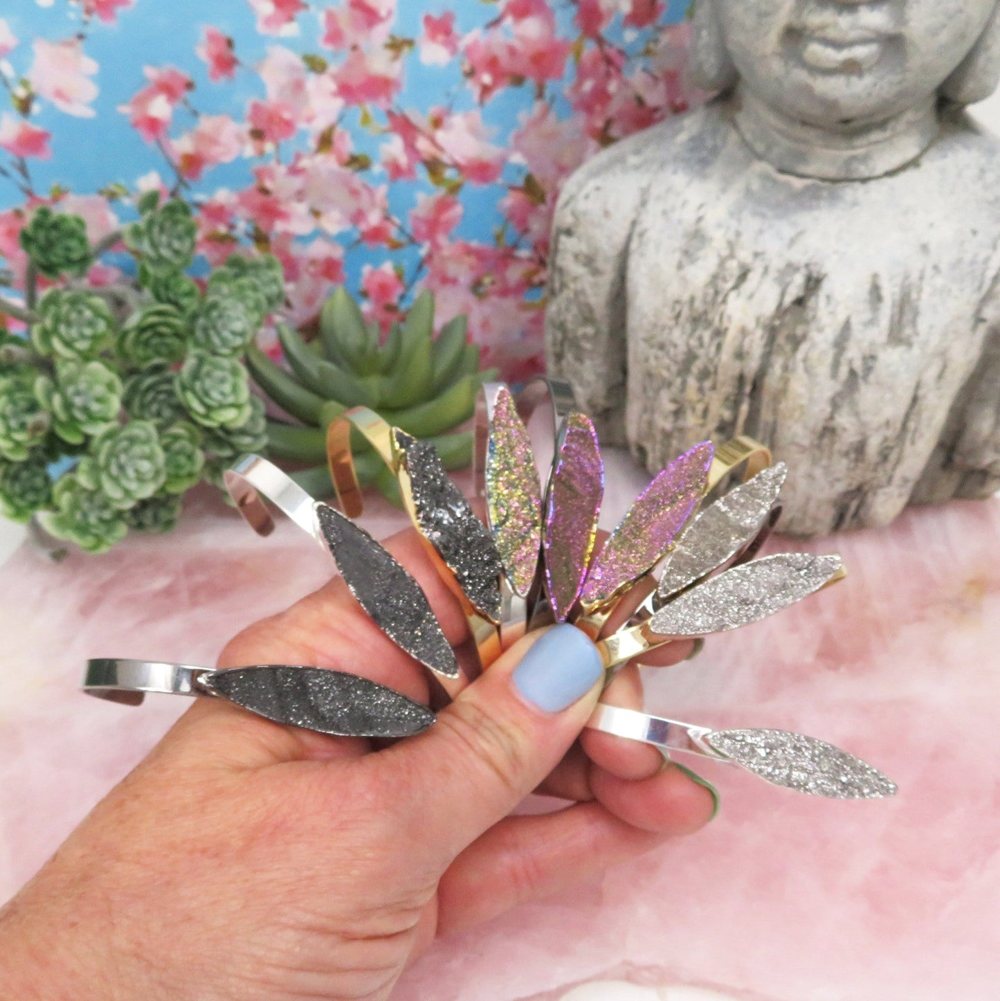 Titanium Druzy Stone Bracelets in a hand