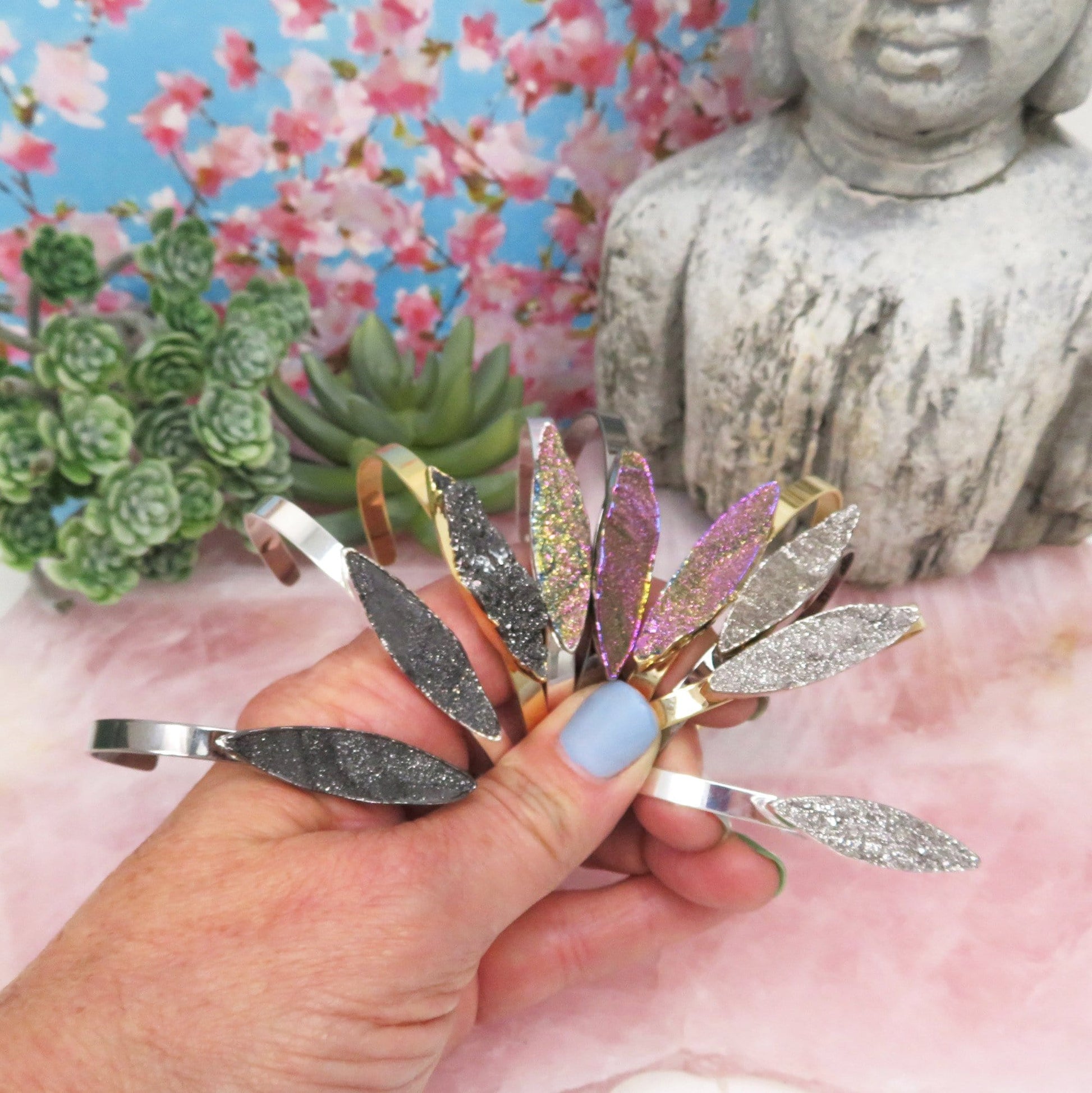 Titanium Druzy Stone Bracelets in a hand