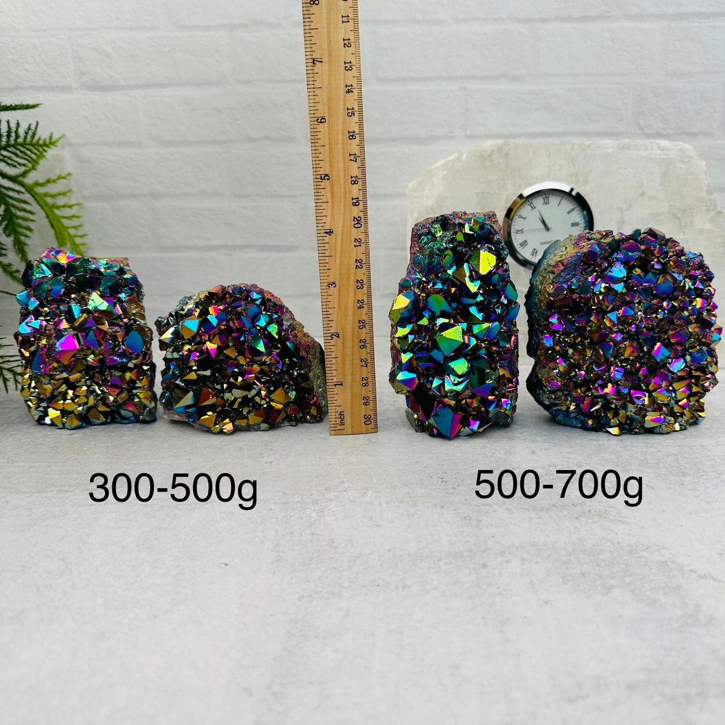 Amethyst Druzy Cutbase with Rainbow Titanium Finish sold by weight. next to a ruler for size reference 