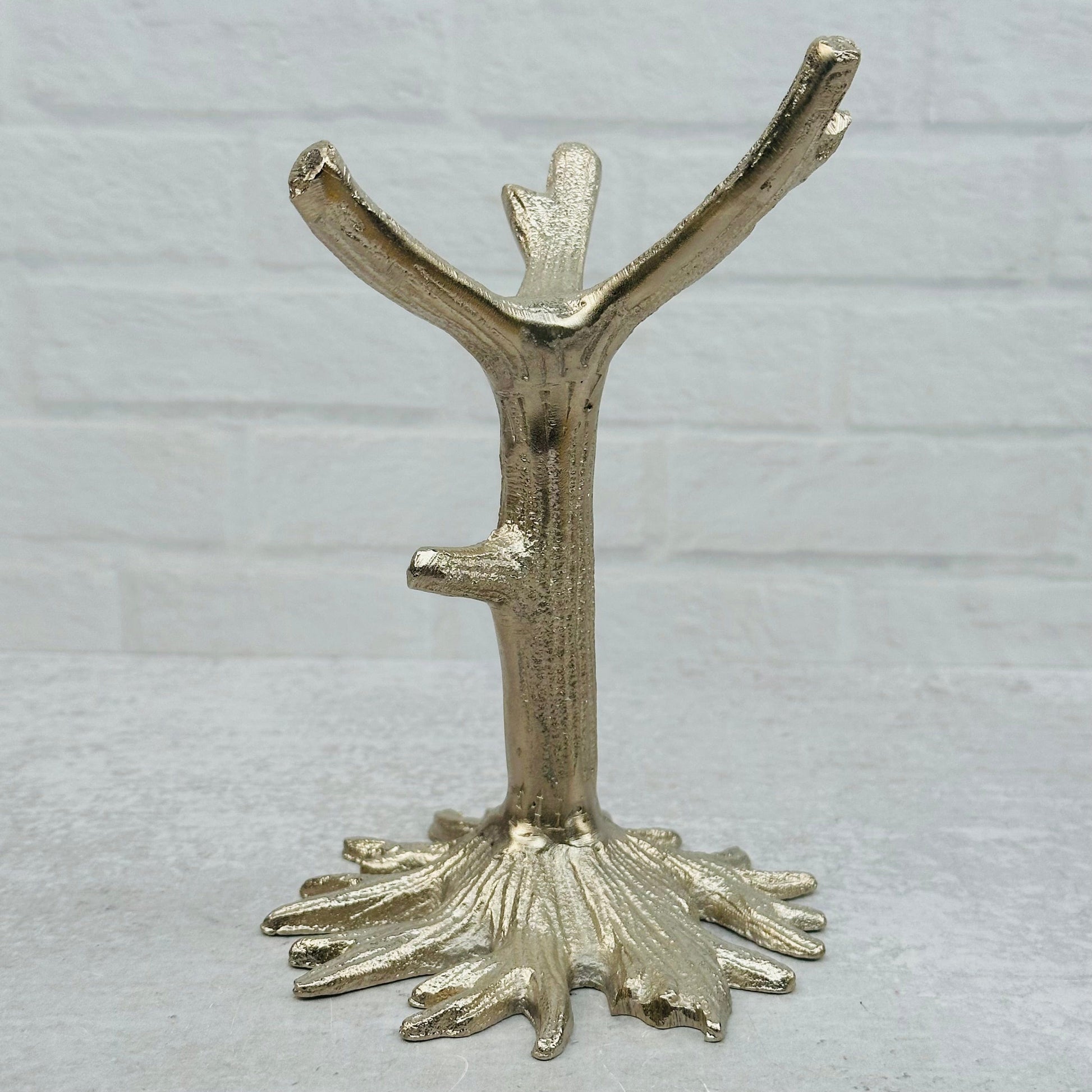 close up of the details on the silver tree stand
