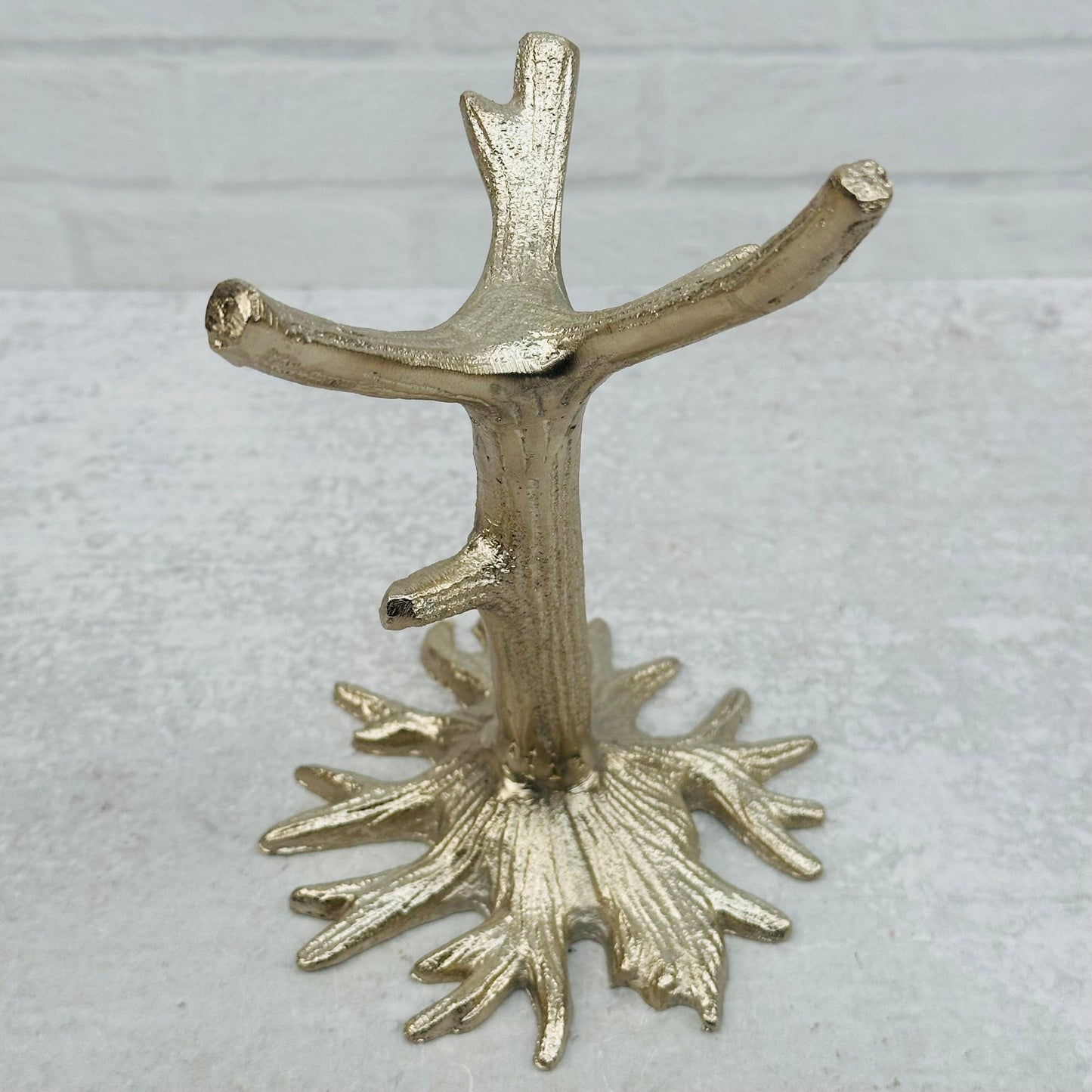 close up of the details on the silver tree stand