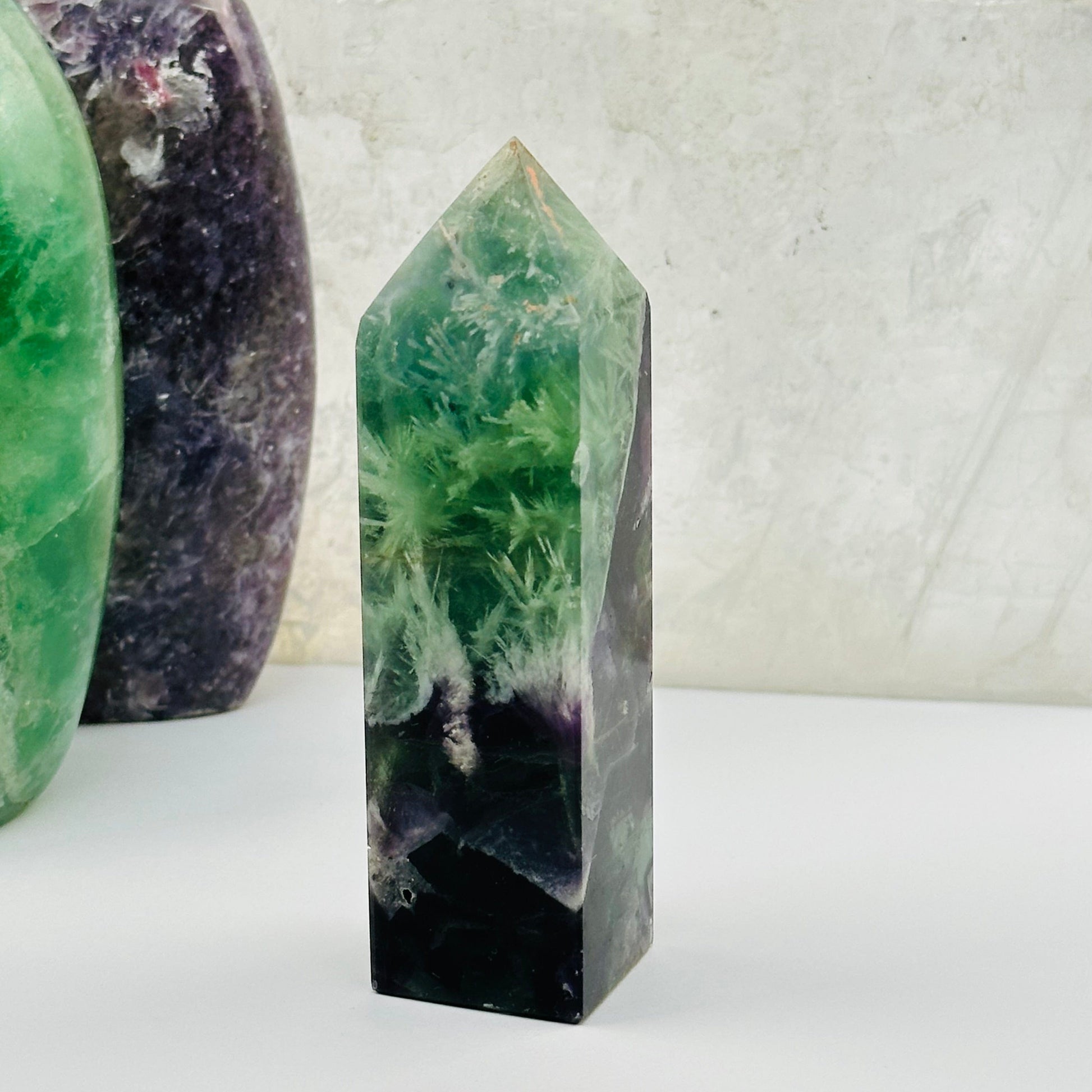 close up of the details on this fluorite crystal point 