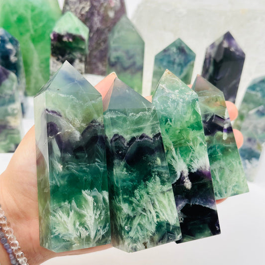 Rainbow Feathered Fluorite Crystal Points in hand for size reference 
