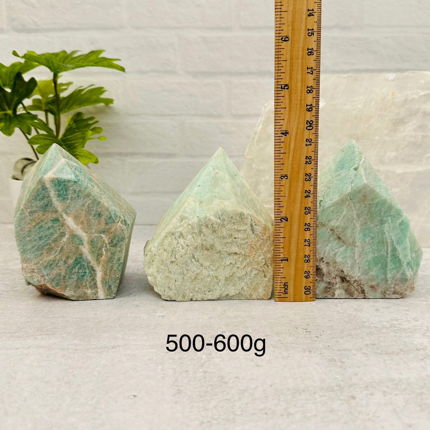 Amazonite Semi Polished Point - By Weight - next to a ruler for size reference