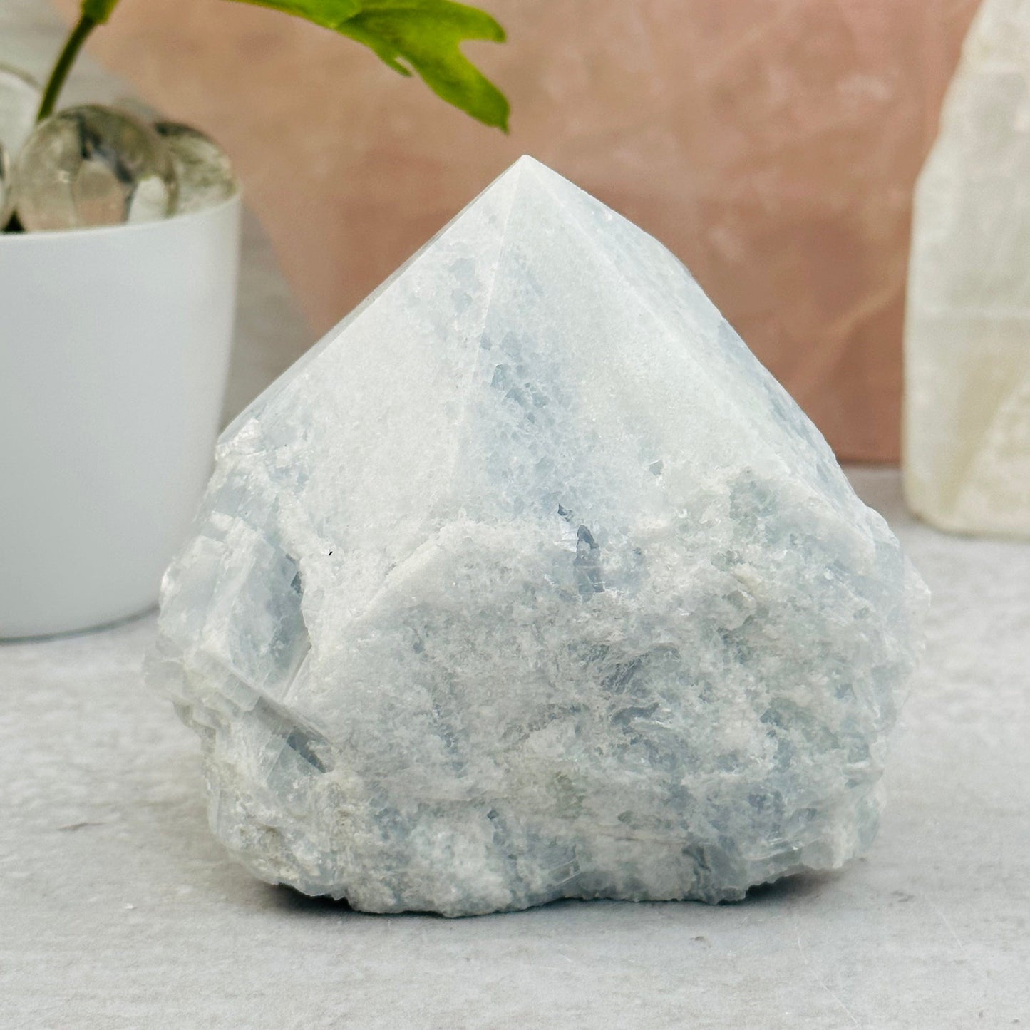 Blue Calcite Semi-Polished Point displayed as home decor 