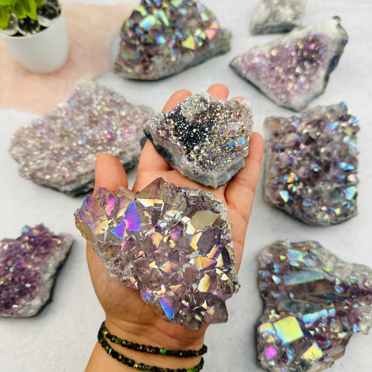 Amethyst Druzy Crystal Cluster with Angel Aura Pearly Finish in hand for size reference 
