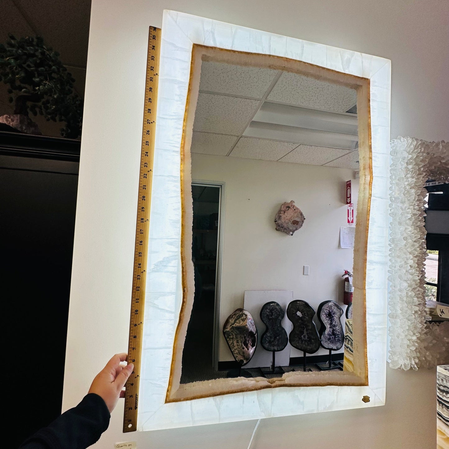 onyx mirror lamp next to a ruler for size reference 