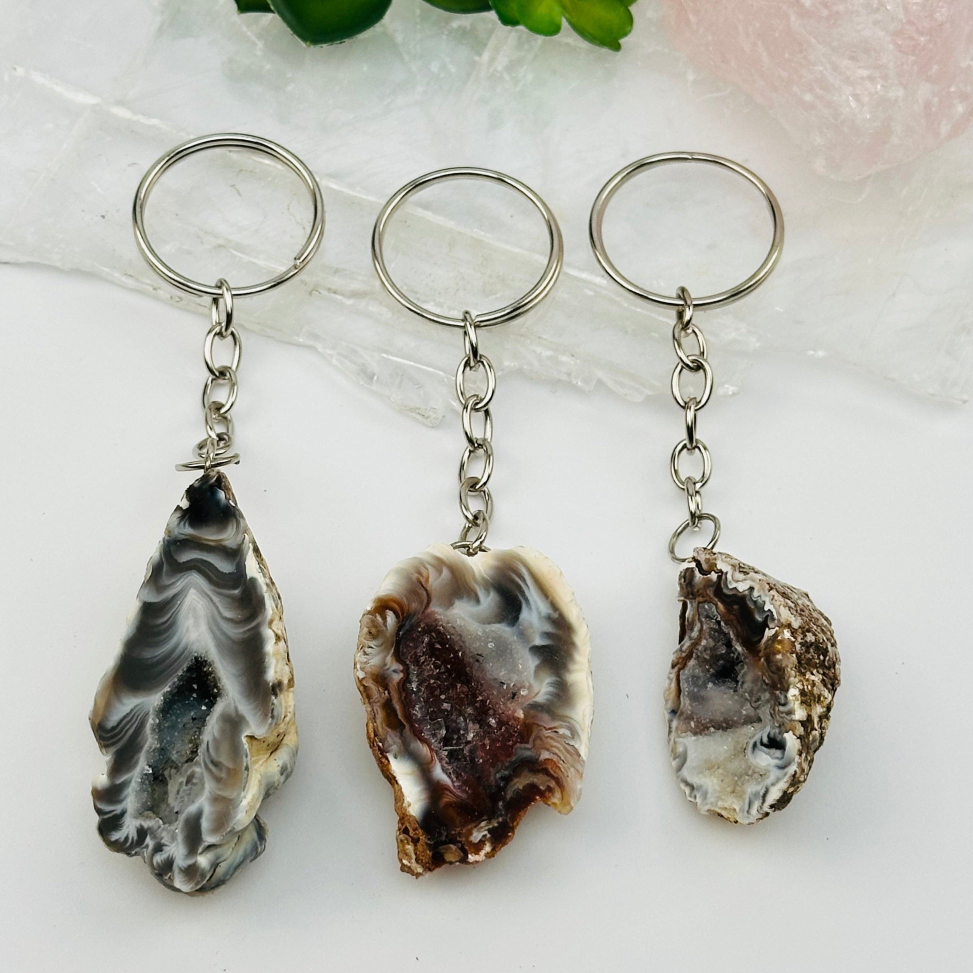 close up of the details on these crystal key chains 
