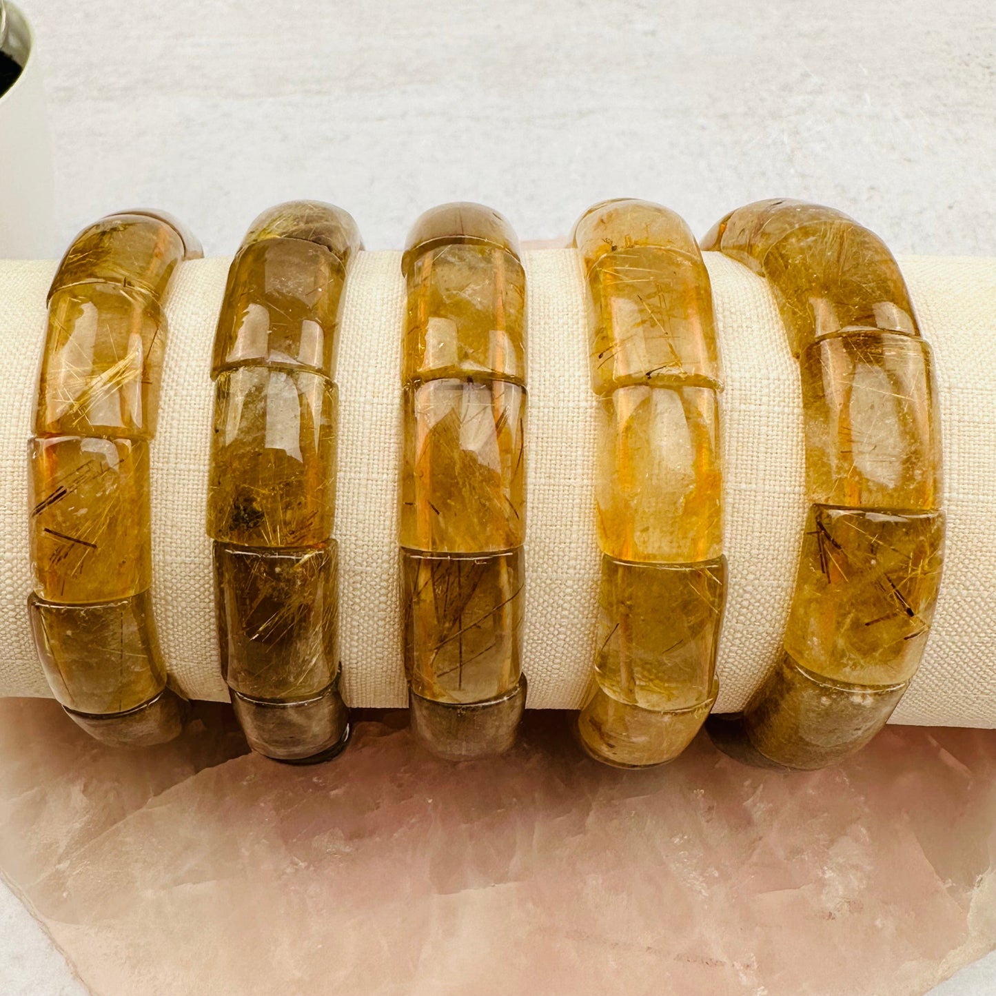 bracelets displayed to show the differences in the sizes and color shades 