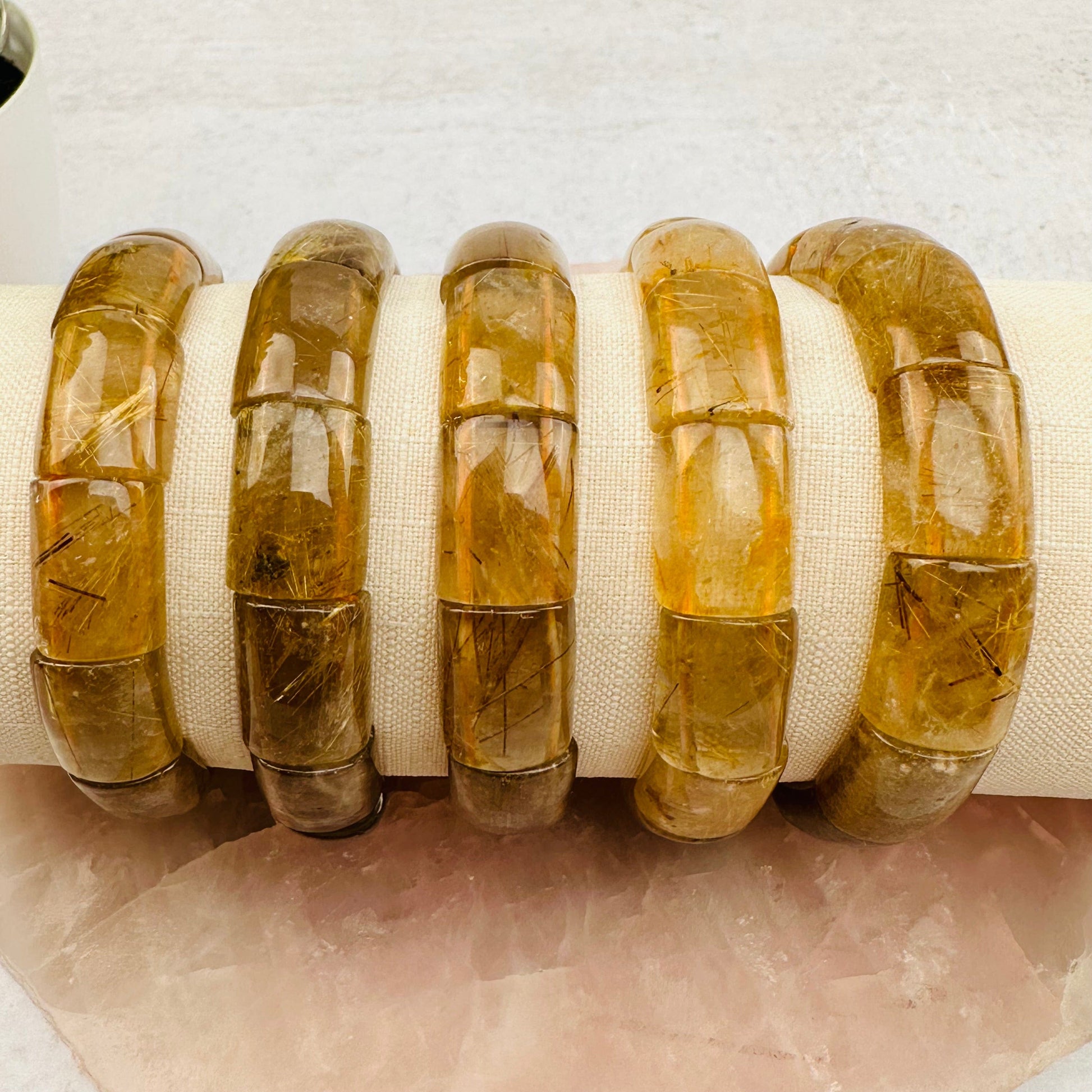 bracelets displayed to show the differences in the sizes and color shades 