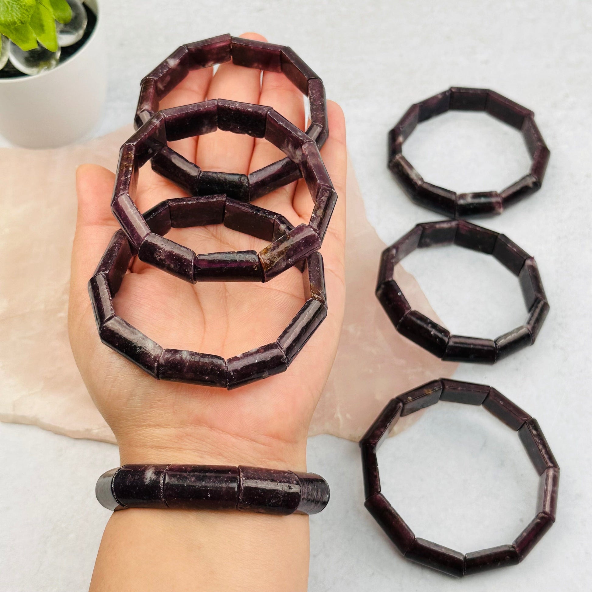 Lepidolite Rectangle Bead Bracelets in hand for size reference 