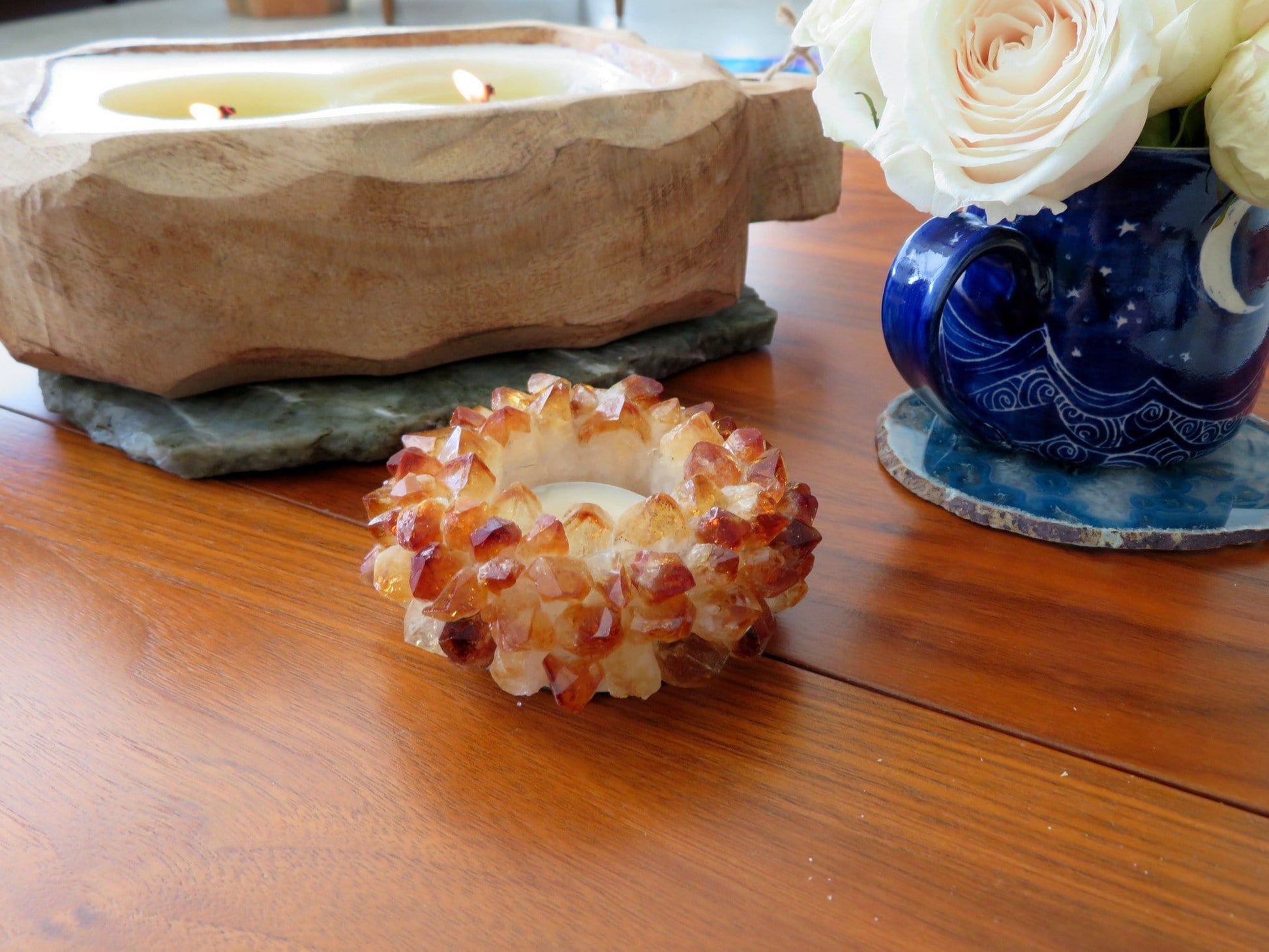 Citrine Point Candle Holder - on a table