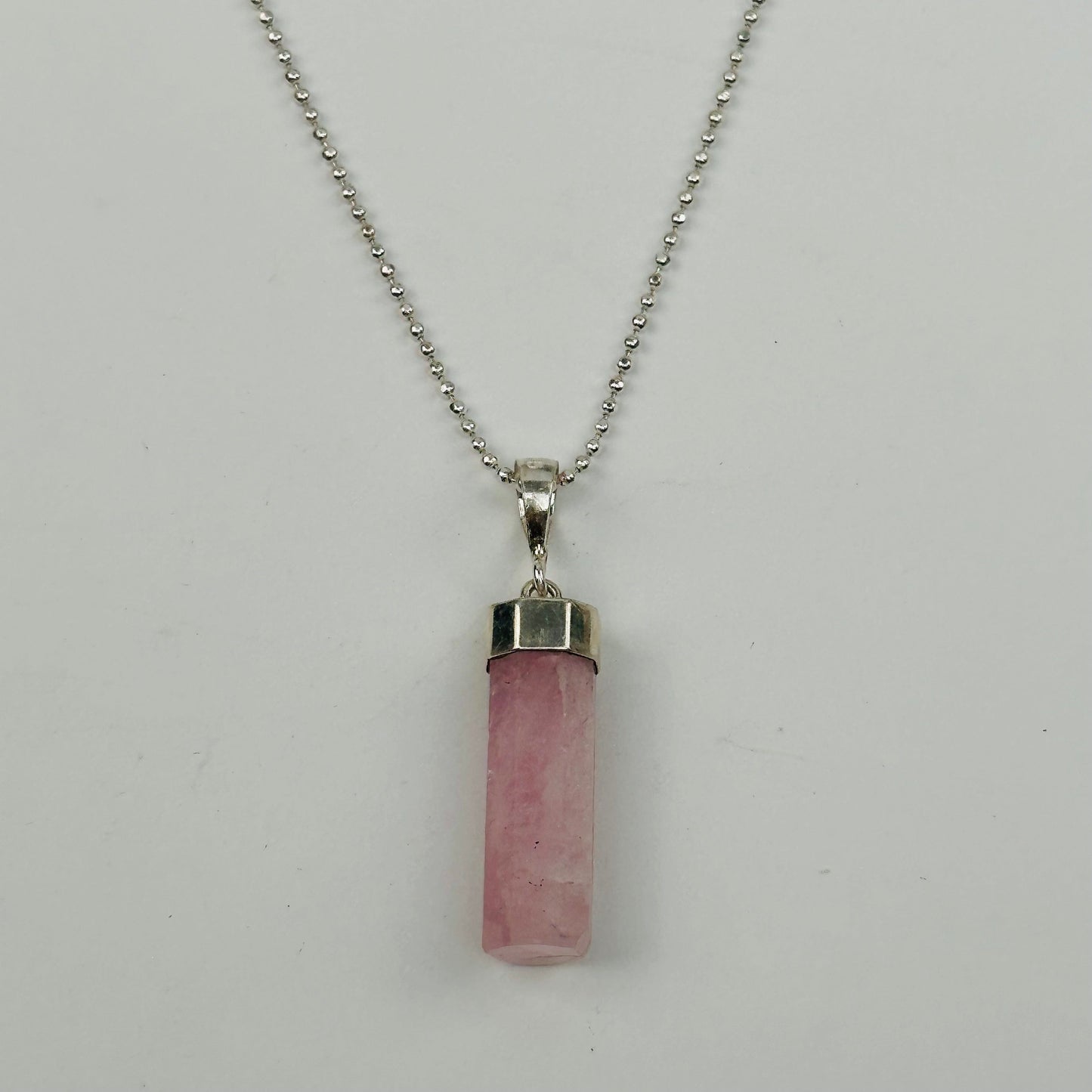 pendant displayed on necklace 