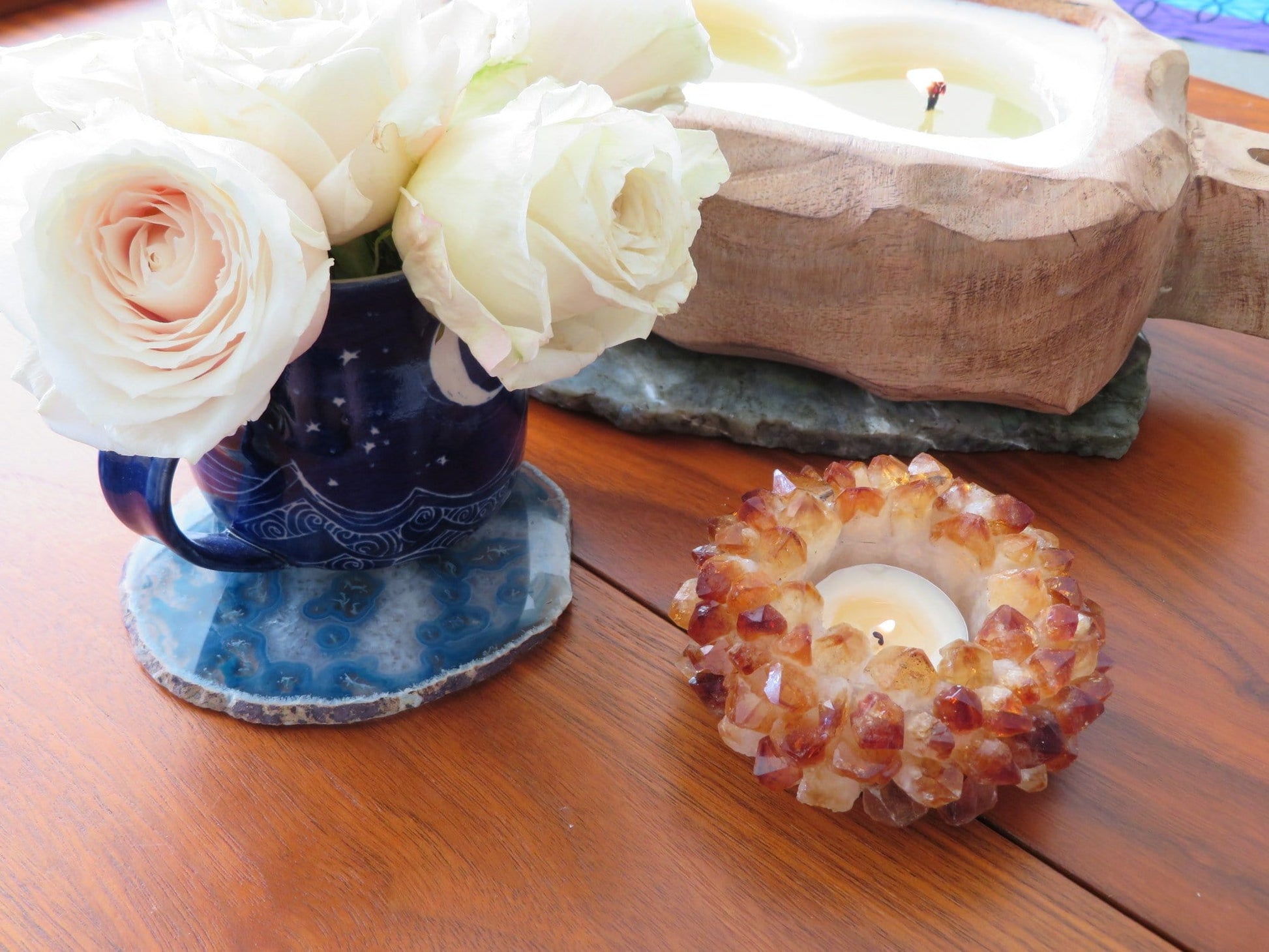Citrine Point Candle Holder - on a table
