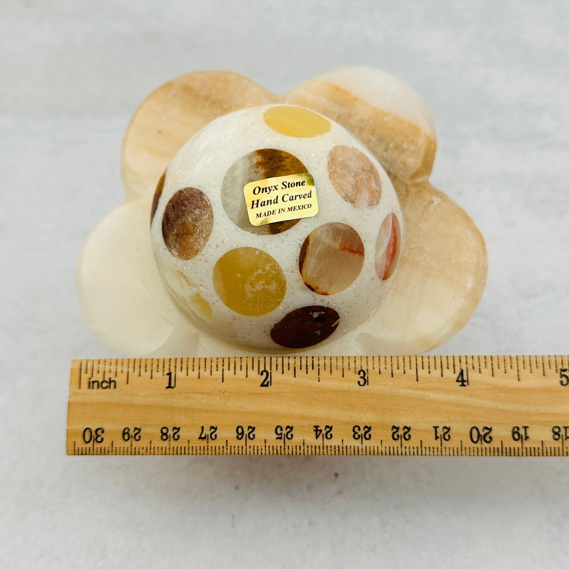 Mexican Onyx Flower Lamp next to a ruler for size reference 