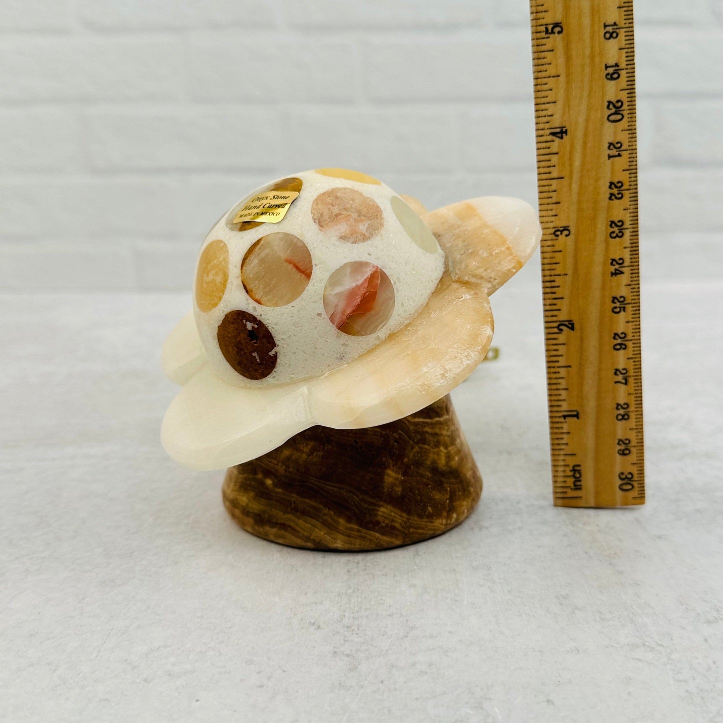 Mexican Onyx Flower Lamp next to a ruler for size reference 